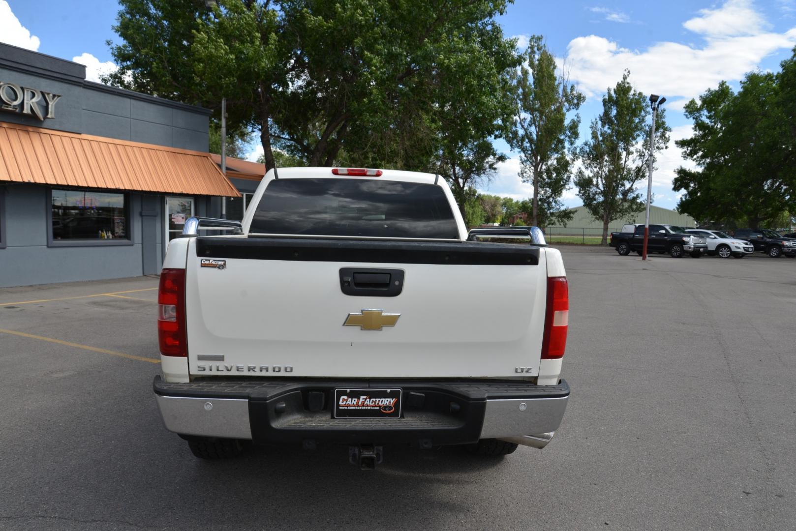 2011 White Diamond /Black Chevrolet Silverado 1500 LTZ Crew Cab 4WD (3GCPKTE31BG) with an 5.3L V8 OHV 16V FFV engine, 4-Speed Automatic transmission, located at 4562 State Avenue, Billings, MT, 59101, (406) 896-9833, 45.769516, -108.526772 - Your looking at a 2011 Chevrolet Silverado 1500 Crew Cab LTZ with a 5 .75 foot Bed With a 5.3 Liter V8 and 6 Speed Automatic Heavy Duty Transmission , Stabilitrac, Traction Control, Anti-lock brakes, Tow Package, 4 Wheel Drive Features include LTZ Package Z71 Package Leather interior with afte - Photo#5