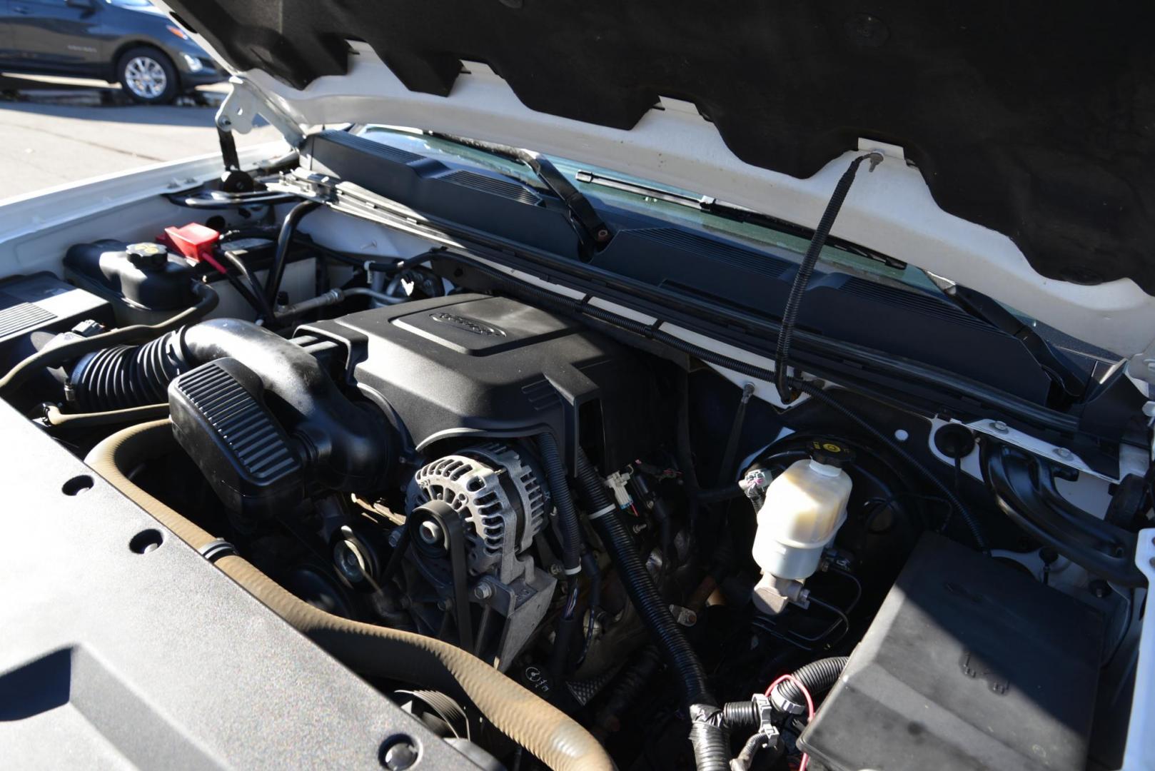 2011 Summit White /Ebony Chevrolet Silverado 1500 LT Ext. Cab 4WD (1GCRKSE37BZ) with an 5.3L V8 OHV 16V FFV engine, 6-Speed Automatic transmission, located at 4562 State Avenue, Billings, MT, 59101, (406) 896-9833, 45.769516, -108.526772 - 2011 Chevy Silverado 1500 LT 4x4 This Chevy is a 2 owner truck. There are no accidents recorded on the history report , the report has multiple service records notated . The Silverado runs and drives nicely. The Interior and exterior are clean. The 18 Inch Yokohama Geolander Tires are in good sha - Photo#10