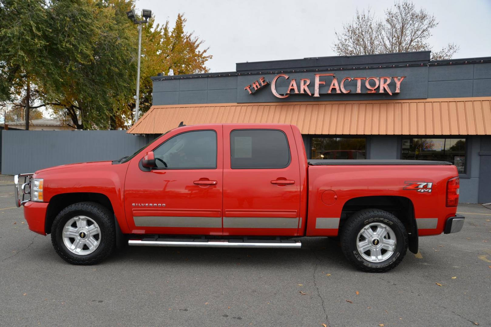 2012 Red /Gray leather Chevrolet Silverado 1500 LTZ Crew Cab 4WD (3GCPKTE70CG) with an 5.3L V8 OHV 16V FFV engine, 6-Speed Automatic transmission, located at 4562 State Avenue, Billings, MT, 59101, (406) 896-9833, 45.769516, -108.526772 - 2012 Chevrolet Silverado 1500 LTZ Crew Cab 4WD - Very clean! 5.3L V8 OHV 16V FFV Engine - 6-Speed Automatic Transmission - Z71 - 4WD - 155,529 miles LTZ Plus package - dual zone climate control - tilt wheel - cruise control - Bose audio with steering wheel controls - power windows and door loc - Photo#2