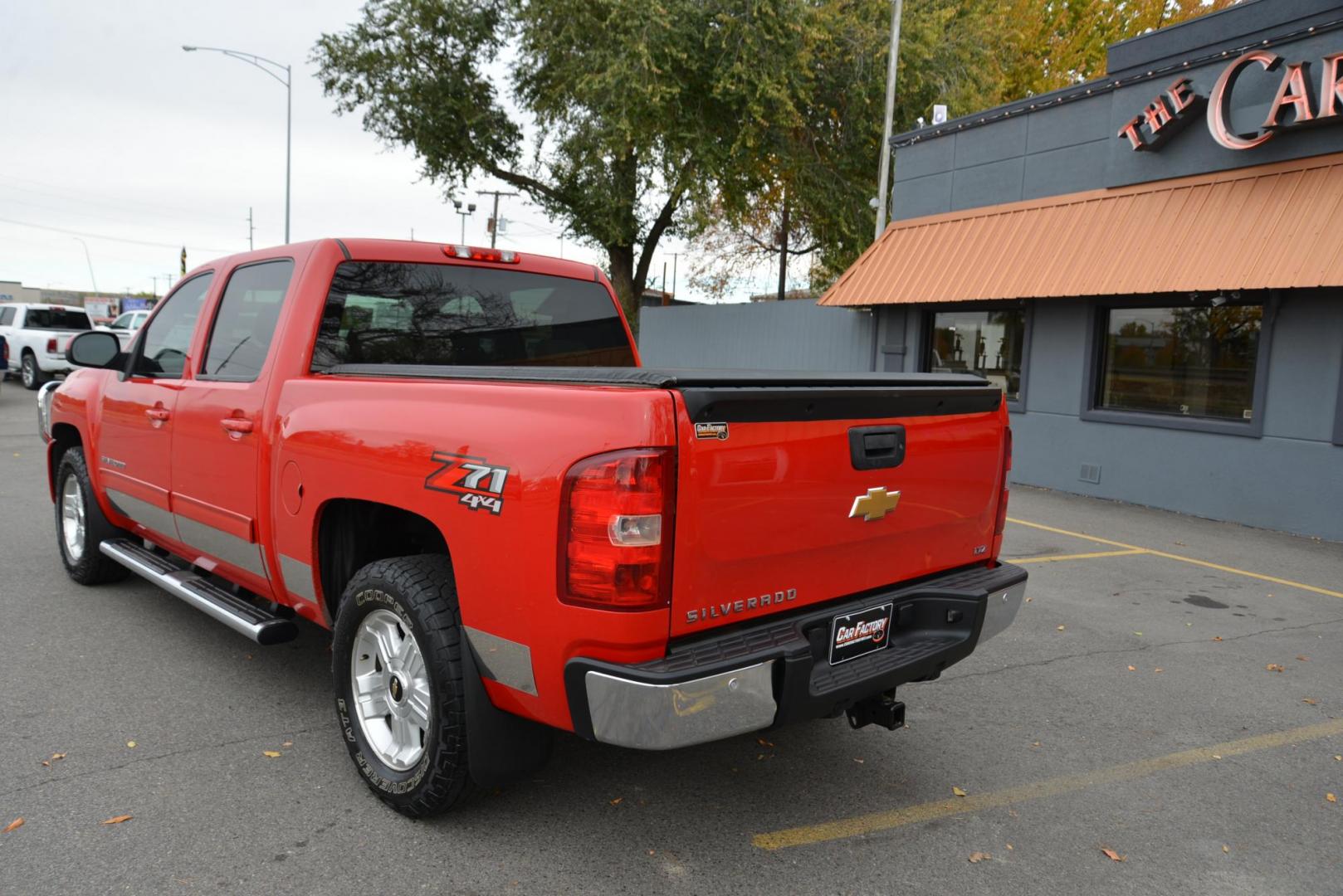 2012 Red /Gray leather Chevrolet Silverado 1500 LTZ Crew Cab 4WD (3GCPKTE70CG) with an 5.3L V8 OHV 16V FFV engine, 6-Speed Automatic transmission, located at 4562 State Avenue, Billings, MT, 59101, (406) 896-9833, 45.769516, -108.526772 - 2012 Chevrolet Silverado 1500 LTZ Crew Cab 4WD - Very clean! 5.3L V8 OHV 16V FFV Engine - 6-Speed Automatic Transmission - Z71 - 4WD - 155,529 miles LTZ Plus package - dual zone climate control - tilt wheel - cruise control - Bose audio with steering wheel controls - power windows and door loc - Photo#3