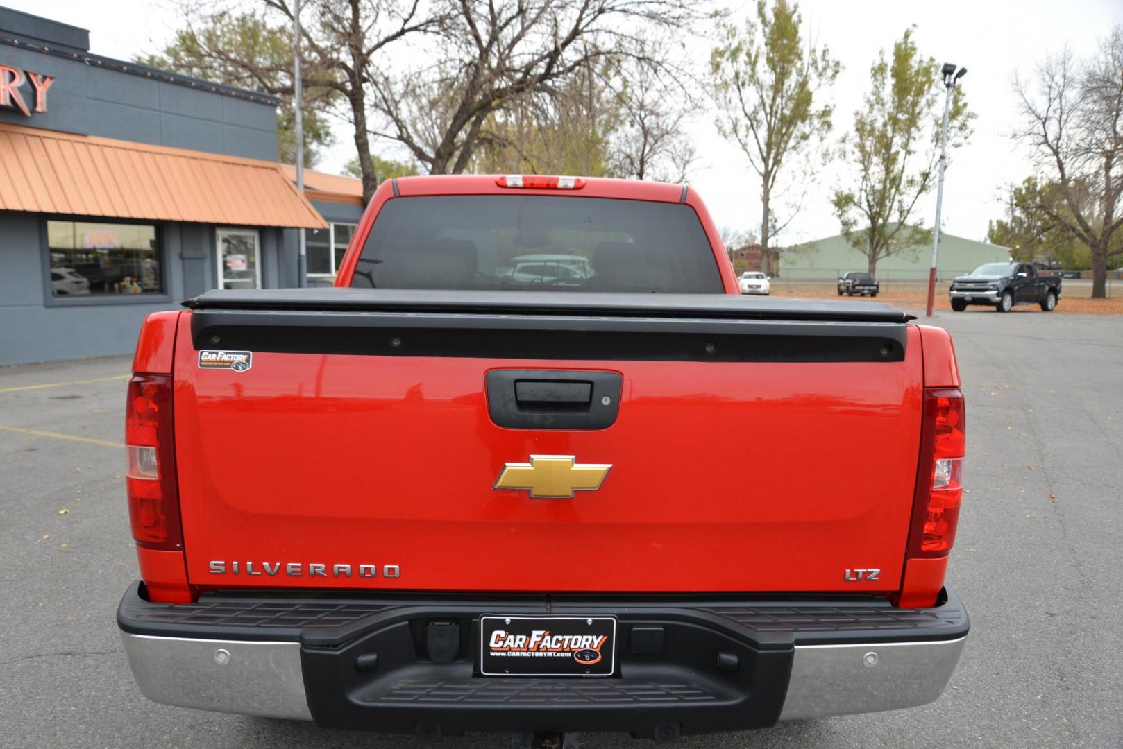 2012 Red /Gray leather Chevrolet Silverado 1500 LTZ Crew Cab 4WD (3GCPKTE70CG) with an 5.3L V8 OHV 16V FFV engine, 6-Speed Automatic transmission, located at 4562 State Avenue, Billings, MT, 59101, (406) 896-9833, 45.769516, -108.526772 - 2012 Chevrolet Silverado 1500 LTZ Crew Cab 4WD - Very clean! 5.3L V8 OHV 16V FFV Engine - 6-Speed Automatic Transmission - Z71 - 4WD - 155,529 miles LTZ Plus package - dual zone climate control - tilt wheel - cruise control - Bose audio with steering wheel controls - power windows and door loc - Photo#5