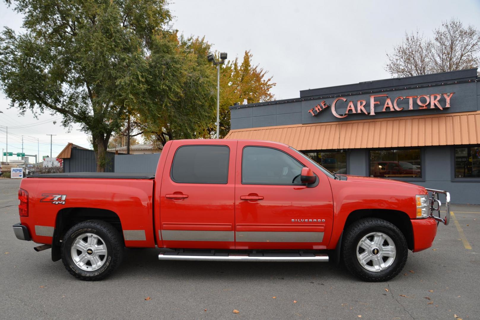 2012 Red /Gray leather Chevrolet Silverado 1500 LTZ Crew Cab 4WD (3GCPKTE70CG) with an 5.3L V8 OHV 16V FFV engine, 6-Speed Automatic transmission, located at 4562 State Avenue, Billings, MT, 59101, (406) 896-9833, 45.769516, -108.526772 - 2012 Chevrolet Silverado 1500 LTZ Crew Cab 4WD - Very clean! 5.3L V8 OHV 16V FFV Engine - 6-Speed Automatic Transmission - Z71 - 4WD - 155,529 miles LTZ Plus package - dual zone climate control - tilt wheel - cruise control - Bose audio with steering wheel controls - power windows and door loc - Photo#9