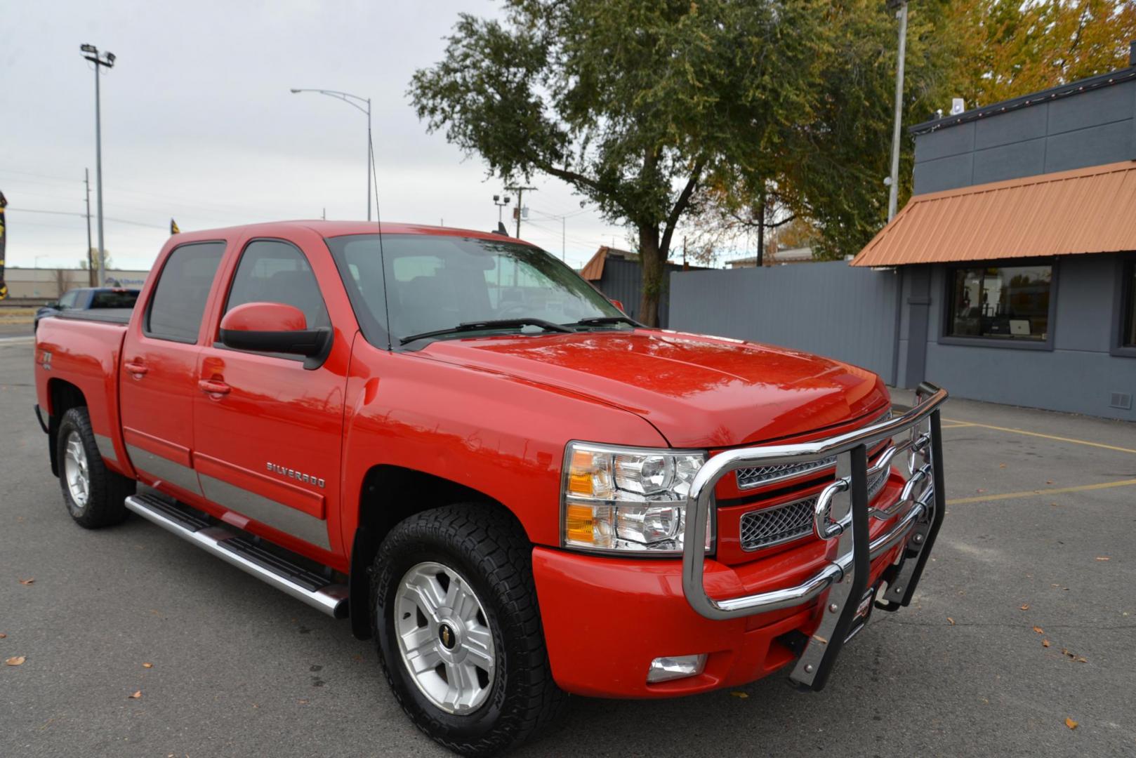 2012 Red /Gray leather Chevrolet Silverado 1500 LTZ Crew Cab 4WD (3GCPKTE70CG) with an 5.3L V8 OHV 16V FFV engine, 6-Speed Automatic transmission, located at 4562 State Avenue, Billings, MT, 59101, (406) 896-9833, 45.769516, -108.526772 - 2012 Chevrolet Silverado 1500 LTZ Crew Cab 4WD - Very clean! 5.3L V8 OHV 16V FFV Engine - 6-Speed Automatic Transmission - Z71 - 4WD - 155,529 miles LTZ Plus package - dual zone climate control - tilt wheel - cruise control - Bose audio with steering wheel controls - power windows and door loc - Photo#10