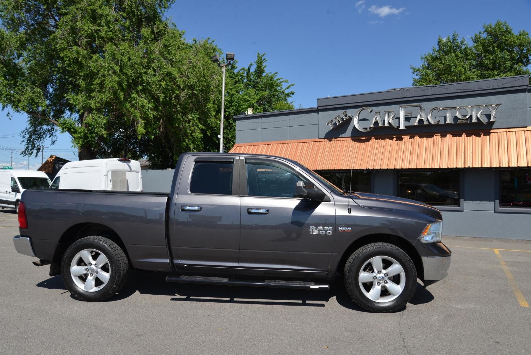 2016 Gray /Gray Cloth RAM 1500 SLT Quad Cab 4WD (1C6RR7GT1GS) with an 5.7L V8 OHV 16V engine, 6A transmission, located at 4562 State Avenue, Billings, MT, 59101, (406) 896-9833, 45.769516, -108.526772 - 2016 RAM 1500 SLT Quad Cab 4WD - Low miles! 5.7L V8 OHV 16V Hemi Engine - 8 speed automatic transmission - 4 wheel drive - 100,585 miles SLT package - air conditioning - tilt wheel - cruise control - bluetooth audio with U connect to pair your devices - power windows and door locks - power sl - Photo #9