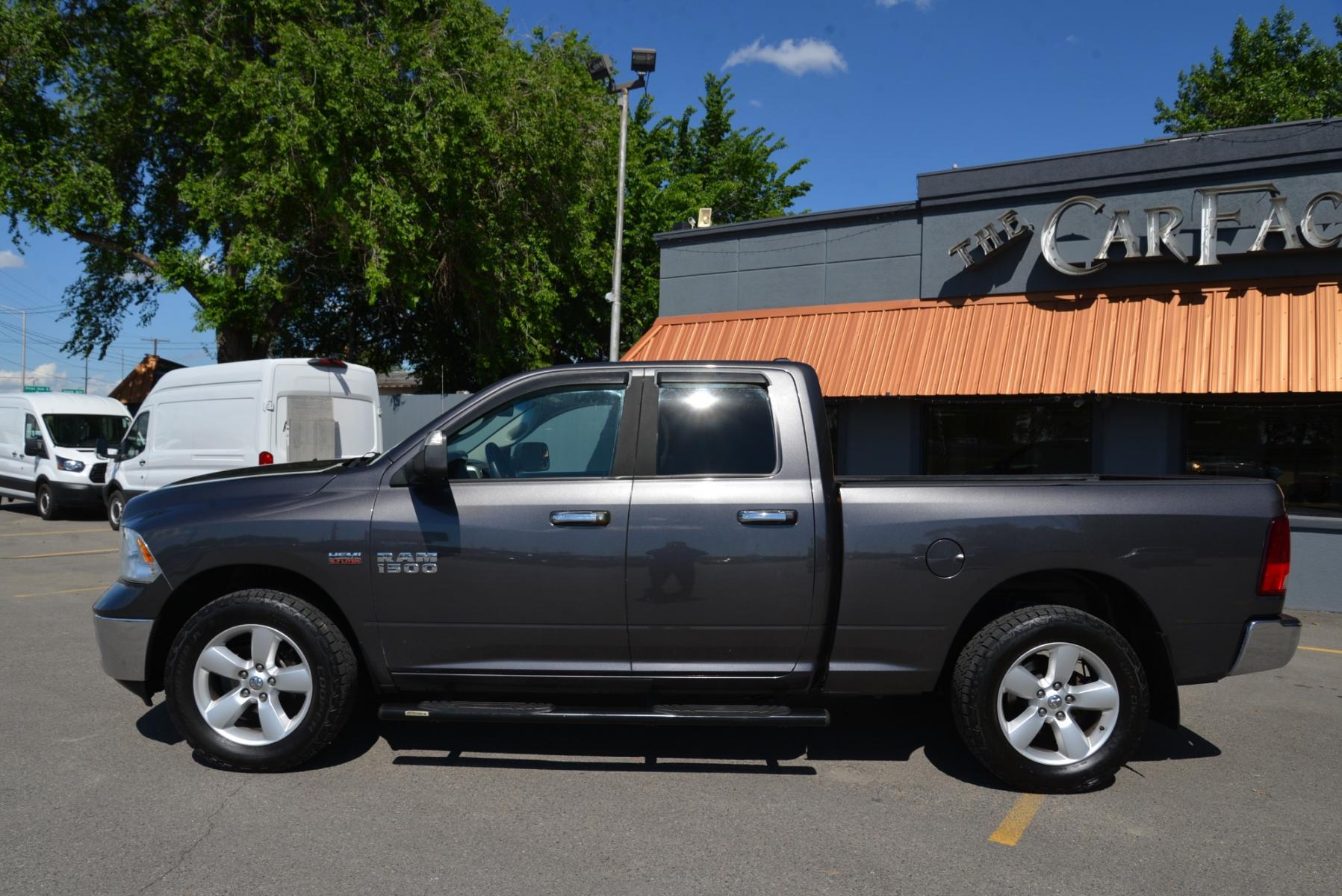 2016 Gray /Gray Cloth RAM 1500 SLT Quad Cab 4WD (1C6RR7GT1GS) with an 5.7L V8 OHV 16V engine, 6A transmission, located at 4562 State Avenue, Billings, MT, 59101, (406) 896-9833, 45.769516, -108.526772 - 2016 RAM 1500 SLT Quad Cab 4WD - Low miles! 5.7L V8 OHV 16V Hemi Engine - 8 speed automatic transmission - 4 wheel drive - 100,585 miles SLT package - air conditioning - tilt wheel - cruise control - bluetooth audio with U connect to pair your devices - power windows and door locks - power sl - Photo #2