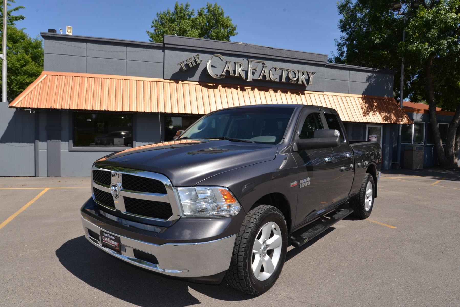 2016 Gray /Gray Cloth RAM 1500 SLT Quad Cab 4WD (1C6RR7GT1GS) with an 5.7L V8 OHV 16V engine, 6A transmission, located at 4562 State Avenue, Billings, MT, 59101, (406) 896-9833, 45.769516, -108.526772 - 2016 RAM 1500 SLT Quad Cab 4WD - Low miles! 5.7L V8 OHV 16V Hemi Engine - 8 speed automatic transmission - 4 wheel drive - 100,585 miles SLT package - air conditioning - tilt wheel - cruise control - bluetooth audio with U connect to pair your devices - power windows and door locks - power sl - Photo #1