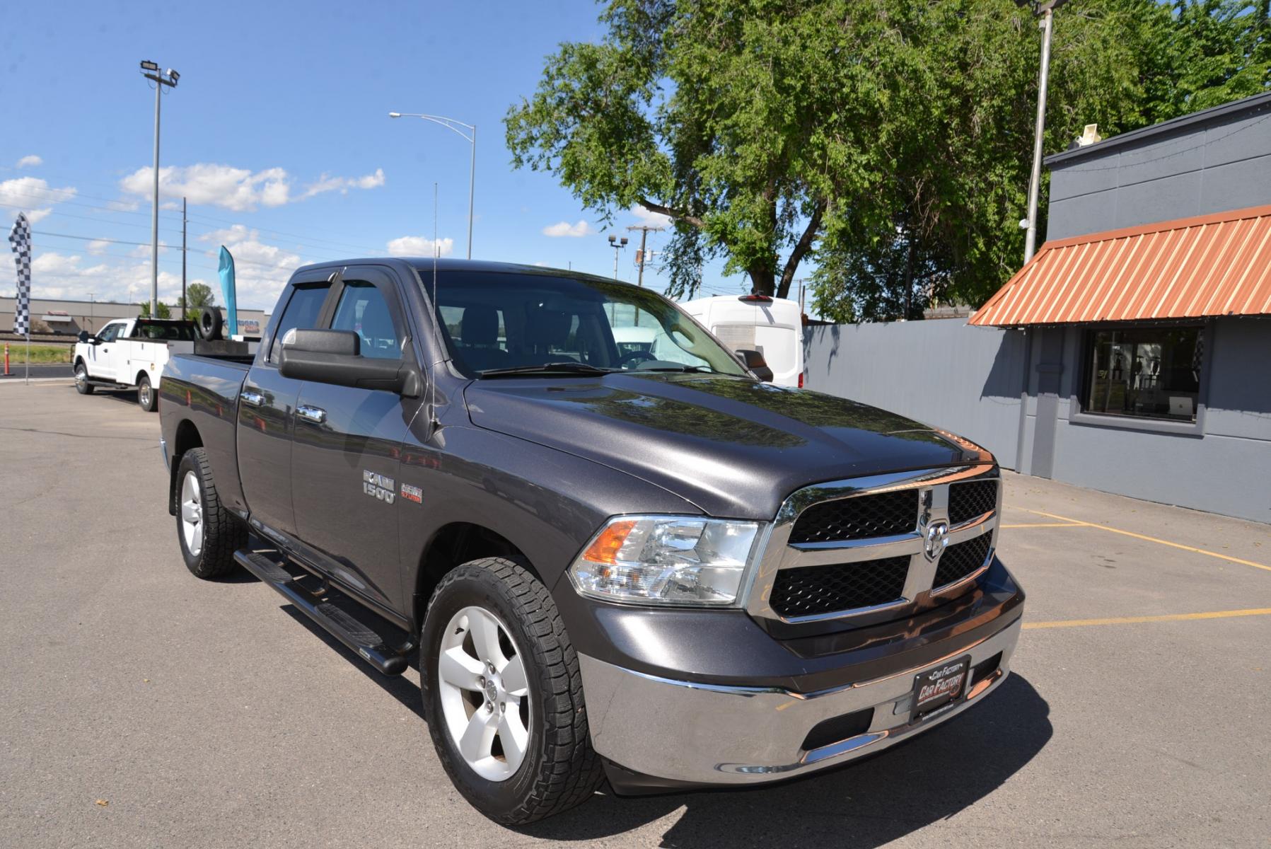 2016 Gray /Gray Cloth RAM 1500 SLT Quad Cab 4WD (1C6RR7GT1GS) with an 5.7L V8 OHV 16V engine, 6A transmission, located at 4562 State Avenue, Billings, MT, 59101, (406) 896-9833, 45.769516, -108.526772 - 2016 RAM 1500 SLT Quad Cab 4WD - Low miles! 5.7L V8 OHV 16V Hemi Engine - 8 speed automatic transmission - 4 wheel drive - 100,585 miles SLT package - air conditioning - tilt wheel - cruise control - bluetooth audio with U connect to pair your devices - power windows and door locks - power sl - Photo #8