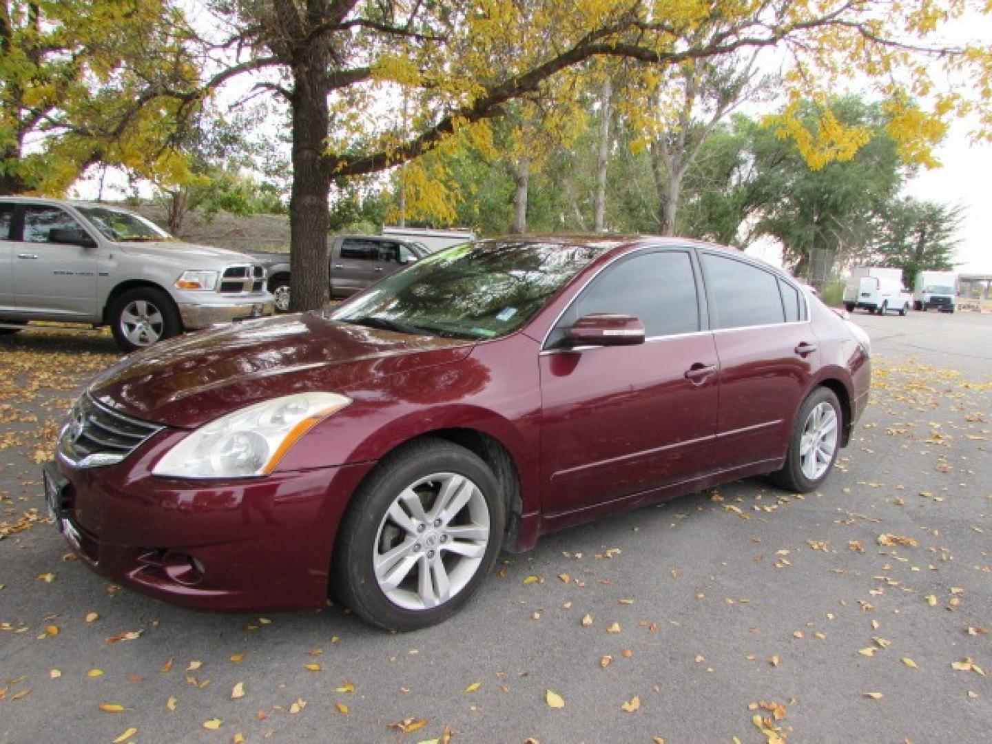 2011 Red /Tan Nissan Altima 3.5 SR (1N4BL2AP1BN) with an 3.5L V6 DOHC 24V engine, Continuously Variable Transmisson transmission, located at 4562 State Avenue, Billings, MT, 59101, (406) 896-9833, 45.769516, -108.526772 - 2011 Nissan Altima 3.5 SR - Leather/moonroof! 3.5L V6 DOHC 24V Engine - CVT automatic transmission - Front wheel drive - 125,051 miles - Inspected and serviced Inspected and serviced - copy of inspection and work performed as well as a complete history report provided! - SR package - clima - Photo#0