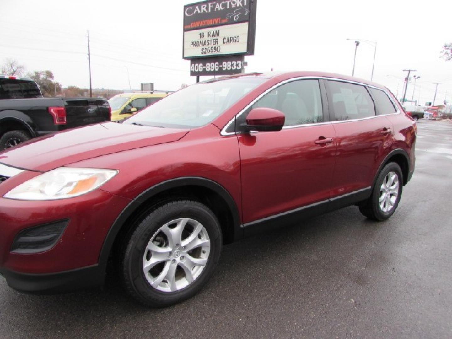 2011 Red /Gray Mazda CX-9 Touring AWD (JM3TB3CVXB0) with an 3.7L V6 DOHC 24V engine, 6-Speed Automatic transmission, located at 4562 State Avenue, Billings, MT, 59101, (406) 896-9833, 45.769516, -108.526772 - Photo#0