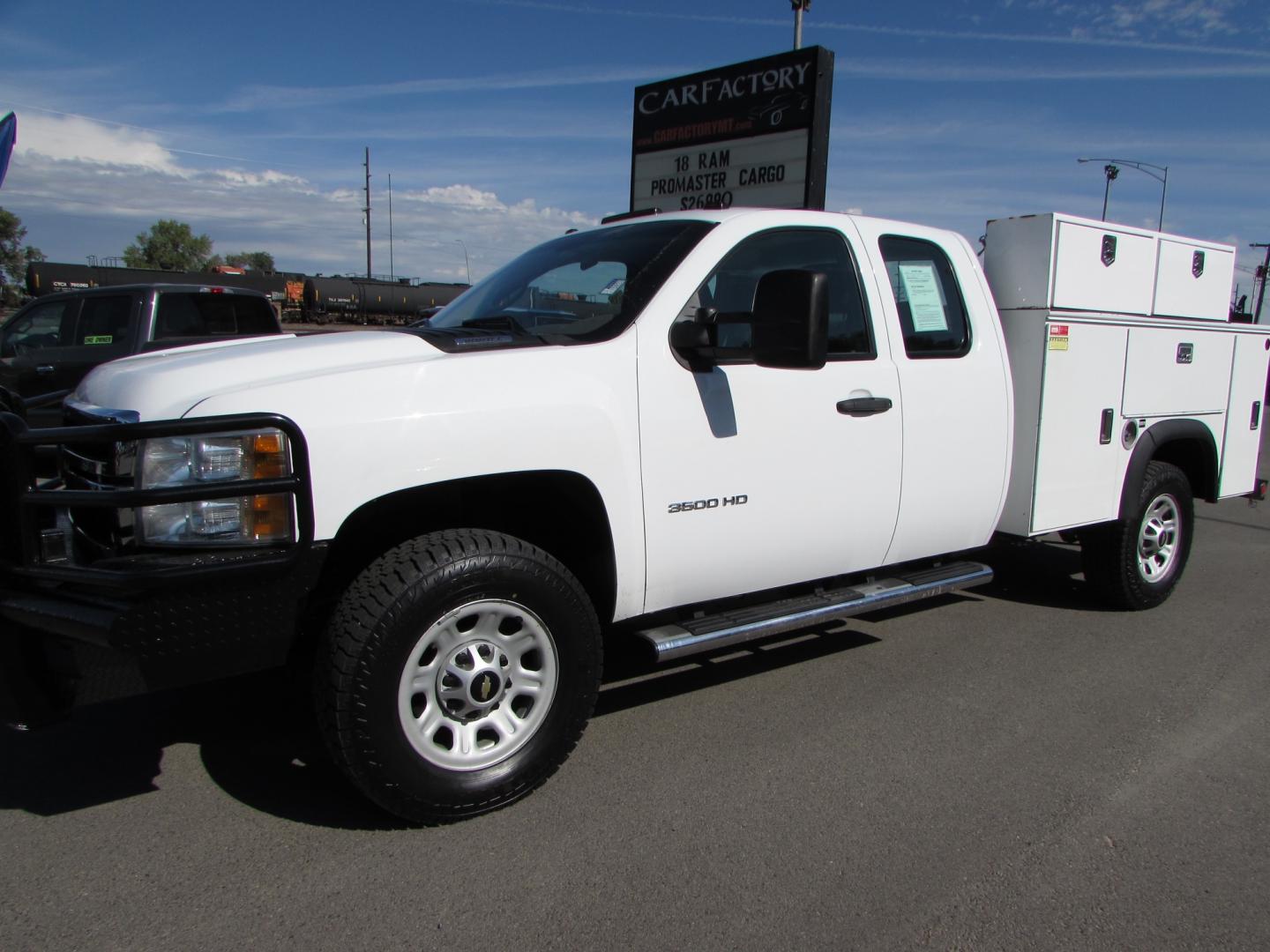 2013 White /Gray Chevrolet Silverado 3500HD Work Truck Ext. Cab Long Box 4WD (1GB5KZCG9DZ) with an 6.0L V8 OHV 16V FFV engine, 6-Speed Automatic transmission, located at 4562 State Avenue, Billings, MT, 59101, (406) 896-9833, 45.769516, -108.526772 - Photo#0