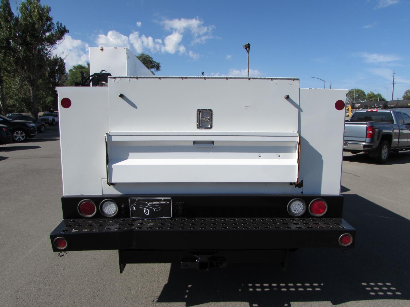 2013 White /Gray Chevrolet Silverado 3500HD Work Truck Ext. Cab Long Box 4WD (1GB5KZCG9DZ) with an 6.0L V8 OHV 16V FFV engine, 6-Speed Automatic transmission, located at 4562 State Avenue, Billings, MT, 59101, (406) 896-9833, 45.769516, -108.526772 - Photo#2