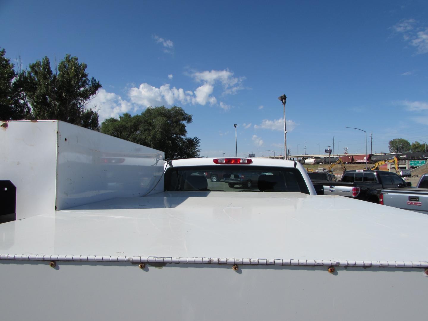 2013 White /Gray Chevrolet Silverado 3500HD Work Truck Ext. Cab Long Box 4WD (1GB5KZCG9DZ) with an 6.0L V8 OHV 16V FFV engine, 6-Speed Automatic transmission, located at 4562 State Avenue, Billings, MT, 59101, (406) 896-9833, 45.769516, -108.526772 - Photo#3