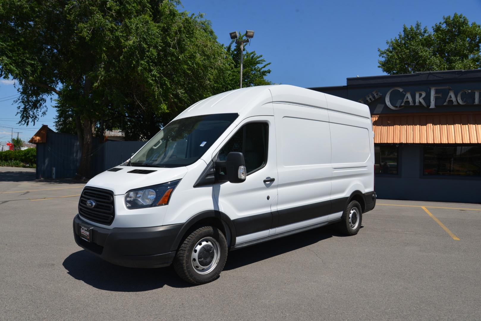 2019 White /Gray Ford Transit 250 250 Van High Roof w/Sliding Pass. 148-in. WB (1FTYR2XMXKK) with an 3.7L V6 DOHC 24V engine, 6A transmission, located at 4562 State Avenue, Billings, MT, 59101, (406) 896-9833, 45.769516, -108.526772 - Photo#1