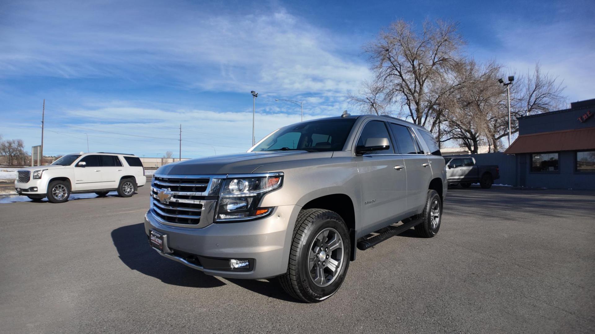 2018 Pepperdust Metallic /Cocoa/Dune Leather Chevrolet Tahoe LT Z71 (1GNSKBKC5JR) with an 5.3 V8 engine, 6 speed automatic transmission, located at 4562 State Avenue, Billings, MT, 59101, (406) 896-9833, 45.769516, -108.526772 - 2018 Chevrolet Tahoe LT 4x4 This Tahoe is a local trade in, it runs and drives nicely, the interior and exterior are clean, there are no accidents recorded on the vehicle history report, the 18 Inch Sumitomo Encounter tires are in next to new shape. with a 5.3 Liter v 8 engine, 6 Speed Automat - Photo#2