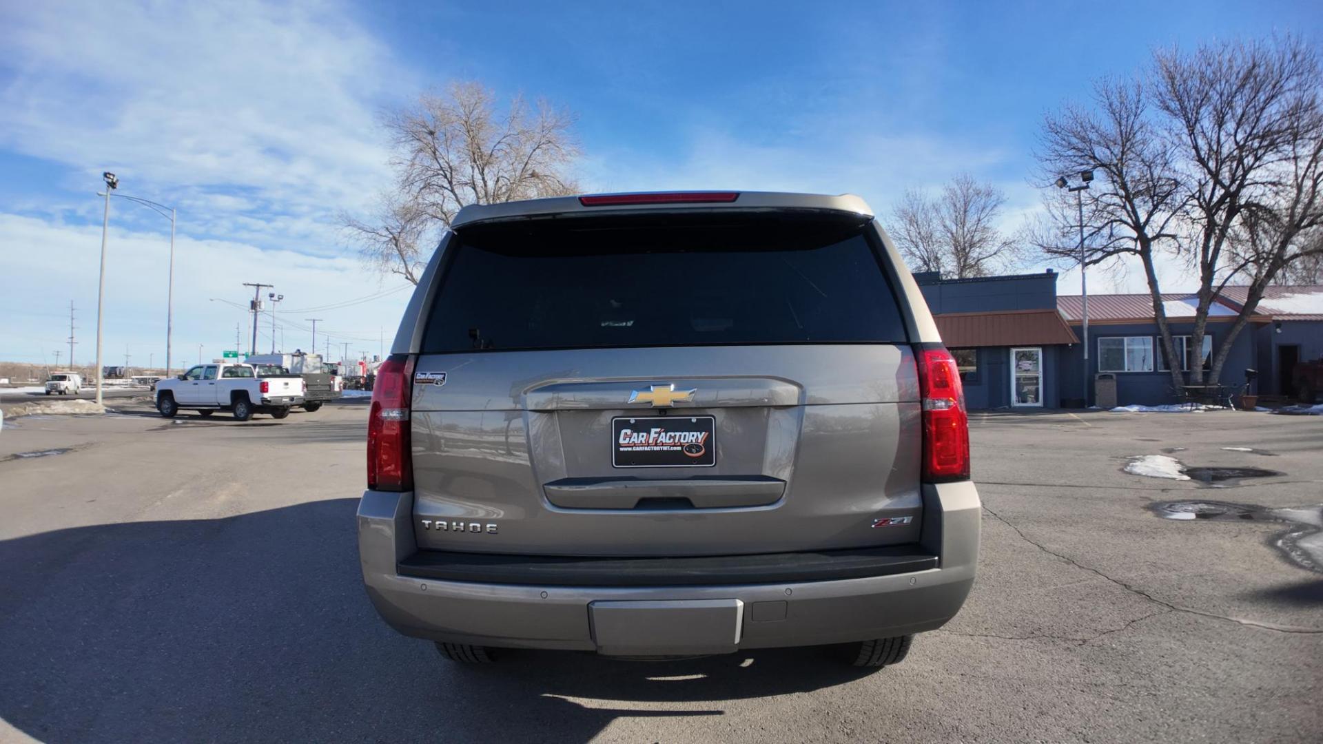 2018 Pepperdust Metallic /Cocoa/Dune Leather Chevrolet Tahoe LT Z71 (1GNSKBKC5JR) with an 5.3 V8 engine, 6 speed automatic transmission, located at 4562 State Avenue, Billings, MT, 59101, (406) 896-9833, 45.769516, -108.526772 - 2018 Chevrolet Tahoe LT 4x4 This Tahoe is a local trade in, it runs and drives nicely, the interior and exterior are clean, there are no accidents recorded on the vehicle history report, the 18 Inch Sumitomo Encounter tires are in next to new shape. with a 5.3 Liter v 8 engine, 6 Speed Automat - Photo#6