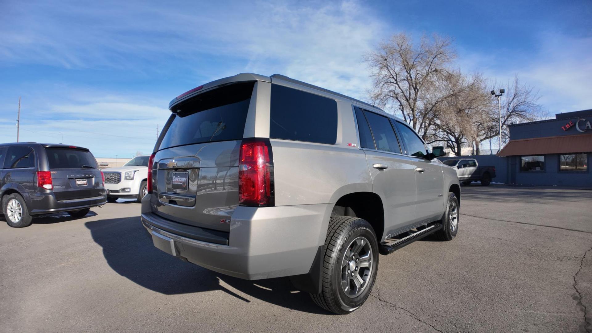 2018 Pepperdust Metallic /Cocoa/Dune Leather Chevrolet Tahoe LT Z71 (1GNSKBKC5JR) with an 5.3 V8 engine, 6 speed automatic transmission, located at 4562 State Avenue, Billings, MT, 59101, (406) 896-9833, 45.769516, -108.526772 - 2018 Chevrolet Tahoe LT 4x4 This Tahoe is a local trade in, it runs and drives nicely, the interior and exterior are clean, there are no accidents recorded on the vehicle history report, the 18 Inch Sumitomo Encounter tires are in next to new shape. with a 5.3 Liter v 8 engine, 6 Speed Automat - Photo#7