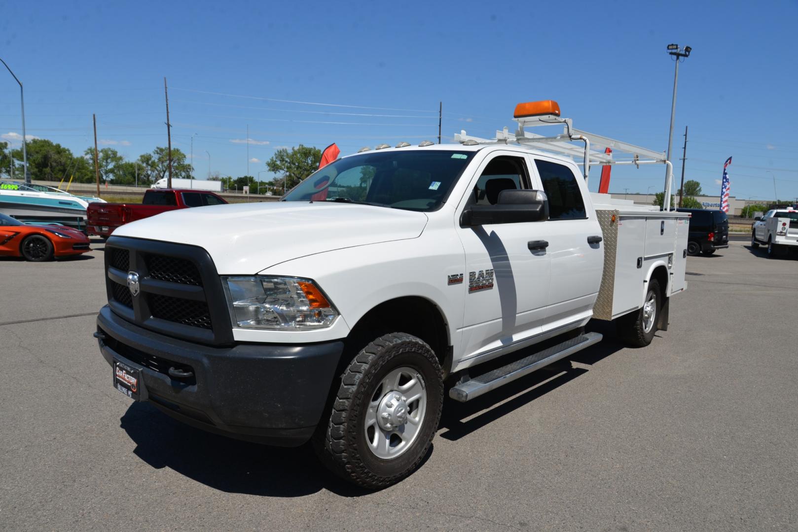 2018 White /Gray RAM 3500 Service Body Crew Cab 4WD (3C7WR9CJ9JG) with an 6.4L Heavy Duty Hemi V8 engine, 6 speed automatic transmission, located at 4562 State Avenue, Billings, MT, 59101, (406) 896-9833, 45.769516, -108.526772 - 2018 Ram 3500 Tradesman Crew Cab 4WD - Service Body - Extremely Clean! 6.4L Heavy Duty Hemi V8 Engine - 6 speed Automatic Transmission - 4WD - Knapheide Steel Service Body - Montana One owner - 102,468 miles - Extremely clean! Tradesman package - air conditioning - tilt wheel - cruise control - Photo#1