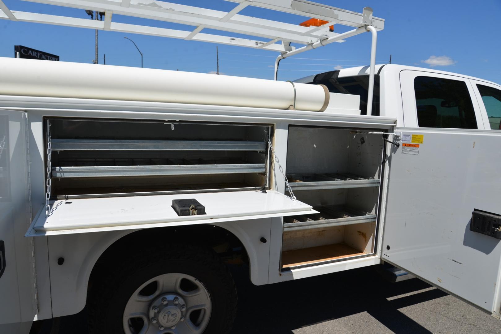 2018 White /Gray RAM 3500 Service Body Crew Cab 4WD (3C7WR9CJ9JG) with an 6.4L Heavy Duty Hemi V8 engine, 6 speed automatic transmission, located at 4562 State Avenue, Billings, MT, 59101, (406) 896-9833, 45.769516, -108.526772 - 2018 Ram 3500 Tradesman Crew Cab 4WD - Service Body - Extremely Clean! 6.4L Heavy Duty Hemi V8 Engine - 6 speed Automatic Transmission - 4WD - Knapheide Steel Service Body - Montana One owner - 102,468 miles - Extremely clean! Tradesman package - air conditioning - tilt wheel - cruise control - Photo#15