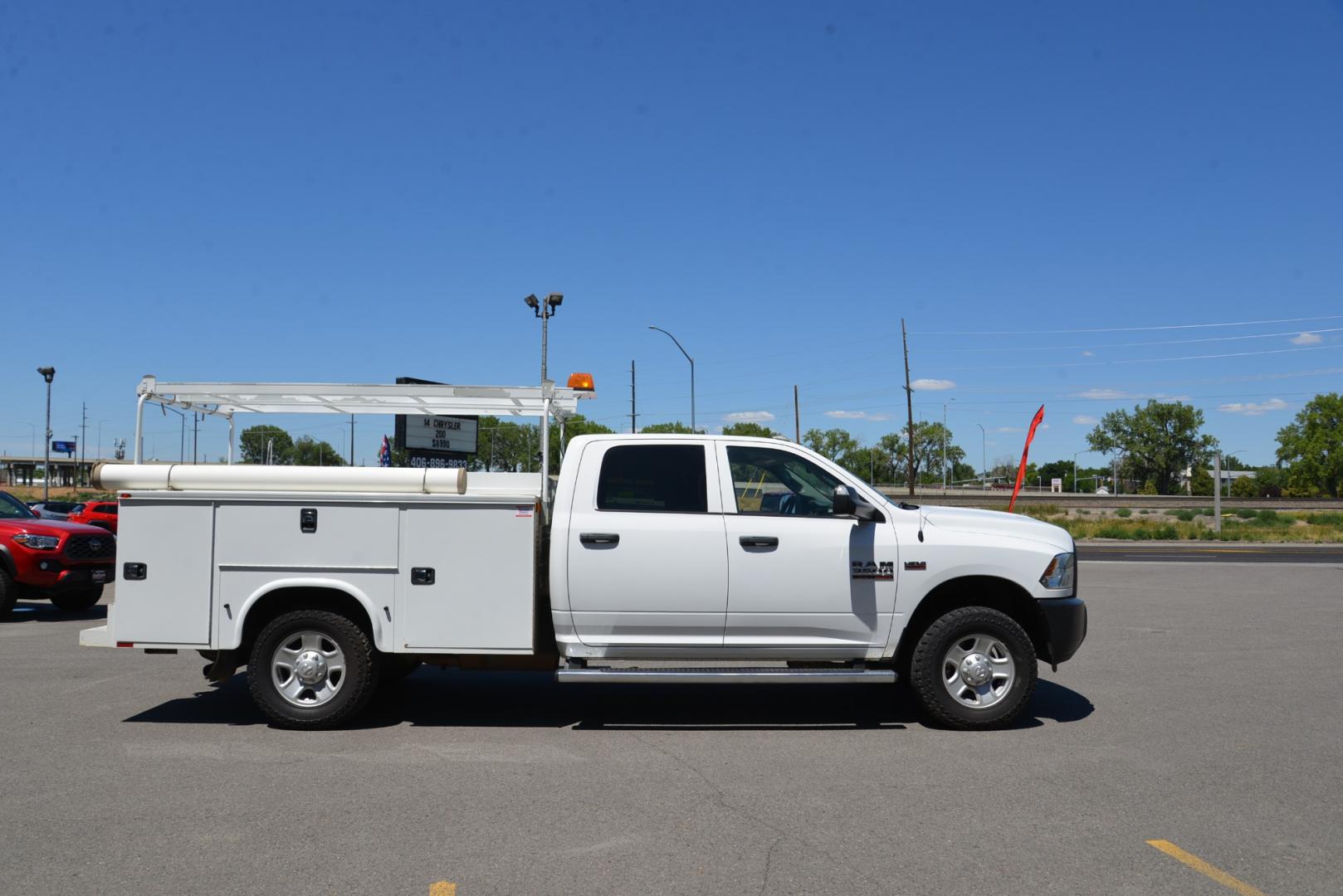 2018 White /Gray RAM 3500 Service Body Crew Cab 4WD (3C7WR9CJ9JG) with an 6.4L Heavy Duty Hemi V8 engine, 6 speed automatic transmission, located at 4562 State Avenue, Billings, MT, 59101, (406) 896-9833, 45.769516, -108.526772 - 2018 Ram 3500 Tradesman Crew Cab 4WD - Service Body - Extremely Clean! 6.4L Heavy Duty Hemi V8 Engine - 6 speed Automatic Transmission - 4WD - Knapheide Steel Service Body - Montana One owner - 102,468 miles - Extremely clean! Tradesman package - air conditioning - tilt wheel - cruise control - Photo#12