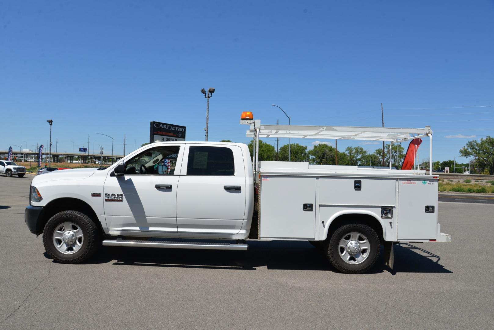 2018 White /Gray RAM 3500 Service Body Crew Cab 4WD (3C7WR9CJ9JG) with an 6.4L Heavy Duty Hemi V8 engine, 6 speed automatic transmission, located at 4562 State Avenue, Billings, MT, 59101, (406) 896-9833, 45.769516, -108.526772 - 2018 Ram 3500 Tradesman Crew Cab 4WD - Service Body - Extremely Clean! 6.4L Heavy Duty Hemi V8 Engine - 6 speed Automatic Transmission - 4WD - Knapheide Steel Service Body - Montana One owner - 102,468 miles - Extremely clean! Tradesman package - air conditioning - tilt wheel - cruise control - Photo#2