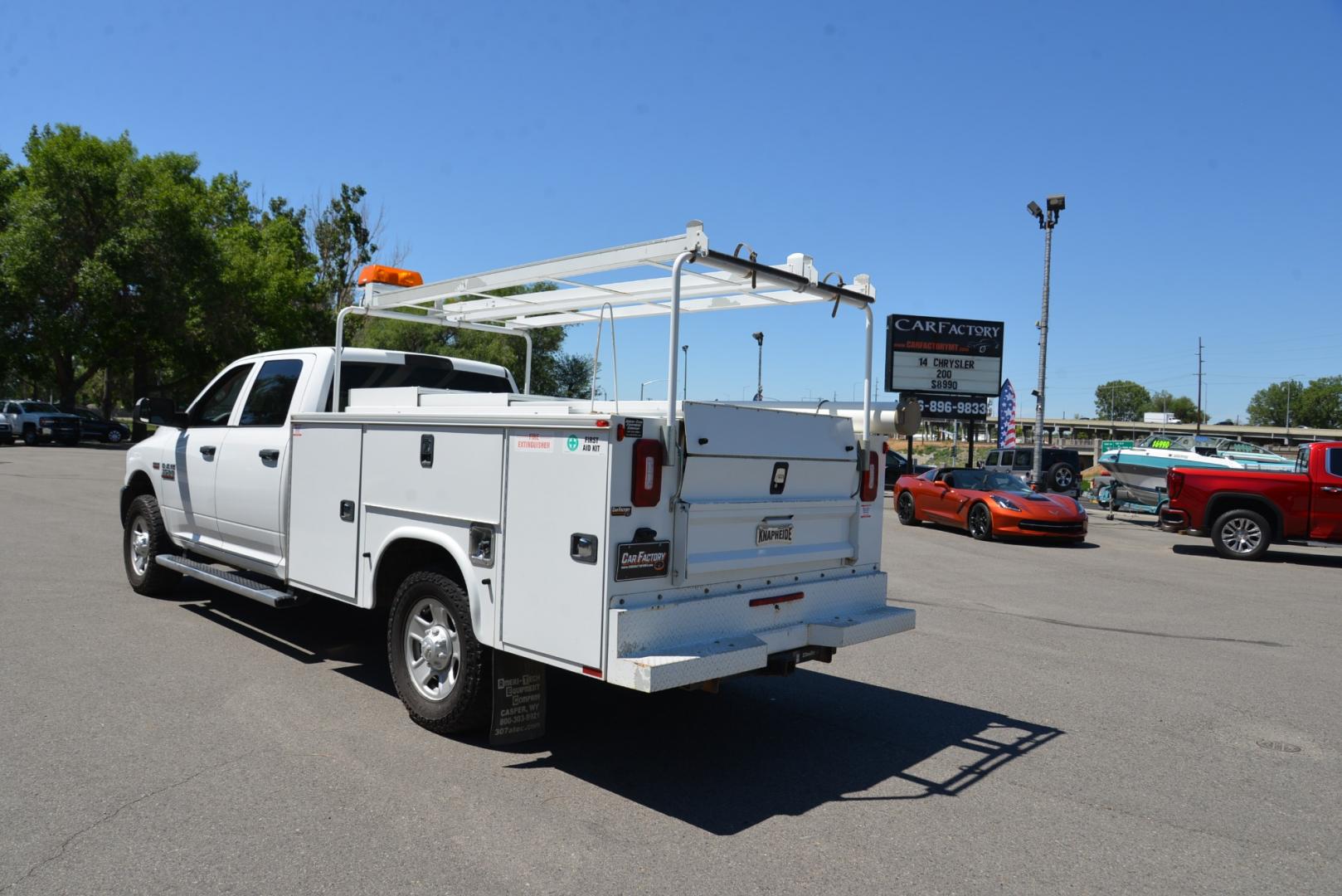 2018 White /Gray RAM 3500 Service Body Crew Cab 4WD (3C7WR9CJ9JG) with an 6.4L Heavy Duty Hemi V8 engine, 6 speed automatic transmission, located at 4562 State Avenue, Billings, MT, 59101, (406) 896-9833, 45.769516, -108.526772 - 2018 Ram 3500 Tradesman Crew Cab 4WD - Service Body - Extremely Clean! 6.4L Heavy Duty Hemi V8 Engine - 6 speed Automatic Transmission - 4WD - Knapheide Steel Service Body - Montana One owner - 102,468 miles - Extremely clean! Tradesman package - air conditioning - tilt wheel - cruise control - Photo#3