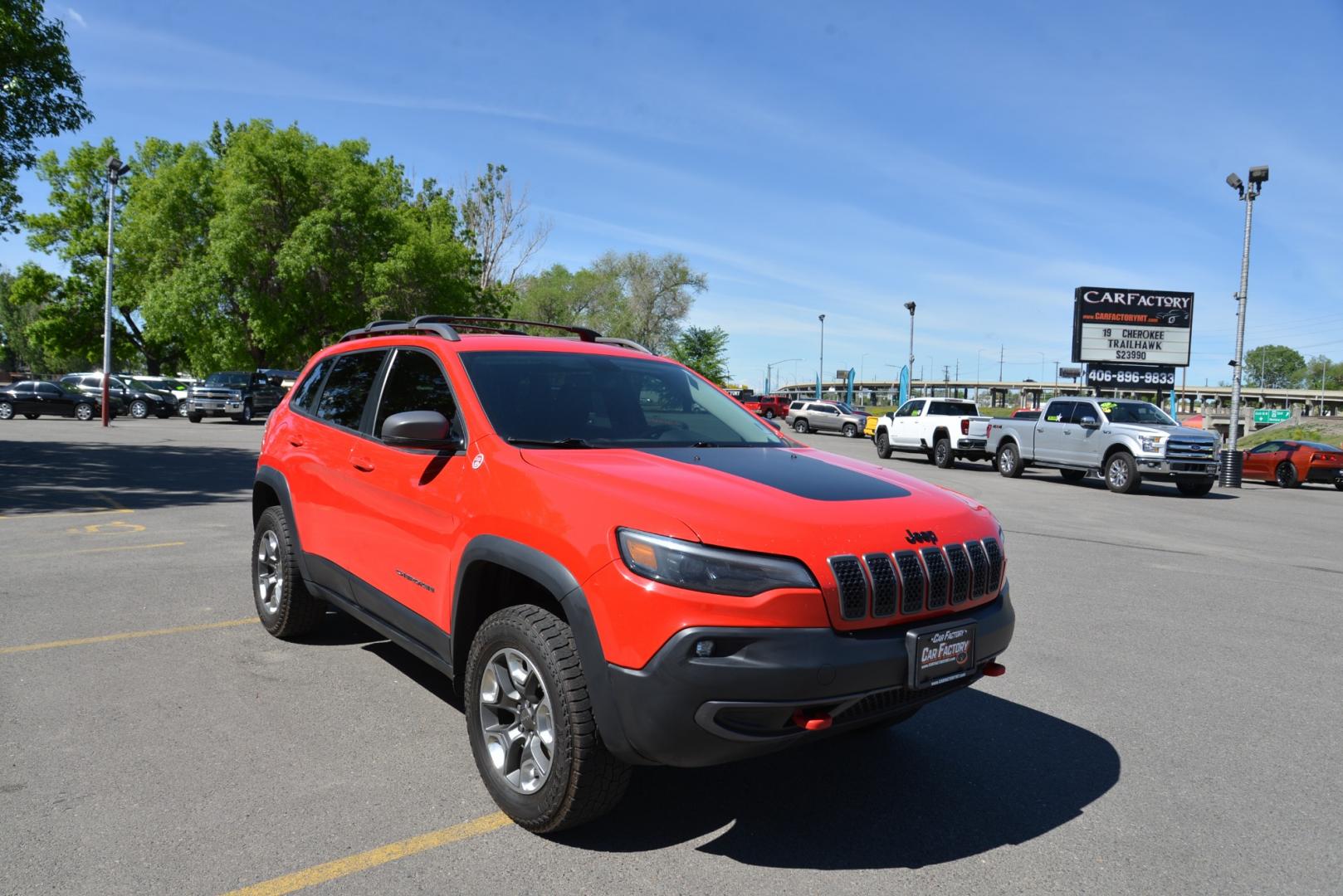 2019 Firecracker Red /Black Leather Jeep Cherokee Trailhawk (1C4PJMBXXKD) with an 3.2L V6 engine, 9 speed automatic transmission, located at 4562 State Avenue, Billings, MT, 59101, (406) 896-9833, 45.769516, -108.526772 - 2019 Jeep Cherokee Trail Hawk 4x4 The Trail Hawk is a Low Mileage Local trade in, it is a 1 Owner jeep. The interior and exterior are in very clean condition and the suv runs and drives nicely. The Tires are 17 Inch Open Range All Terrain's and they are in good condition. it has a 3.2 Liter V6, 9 - Photo#1