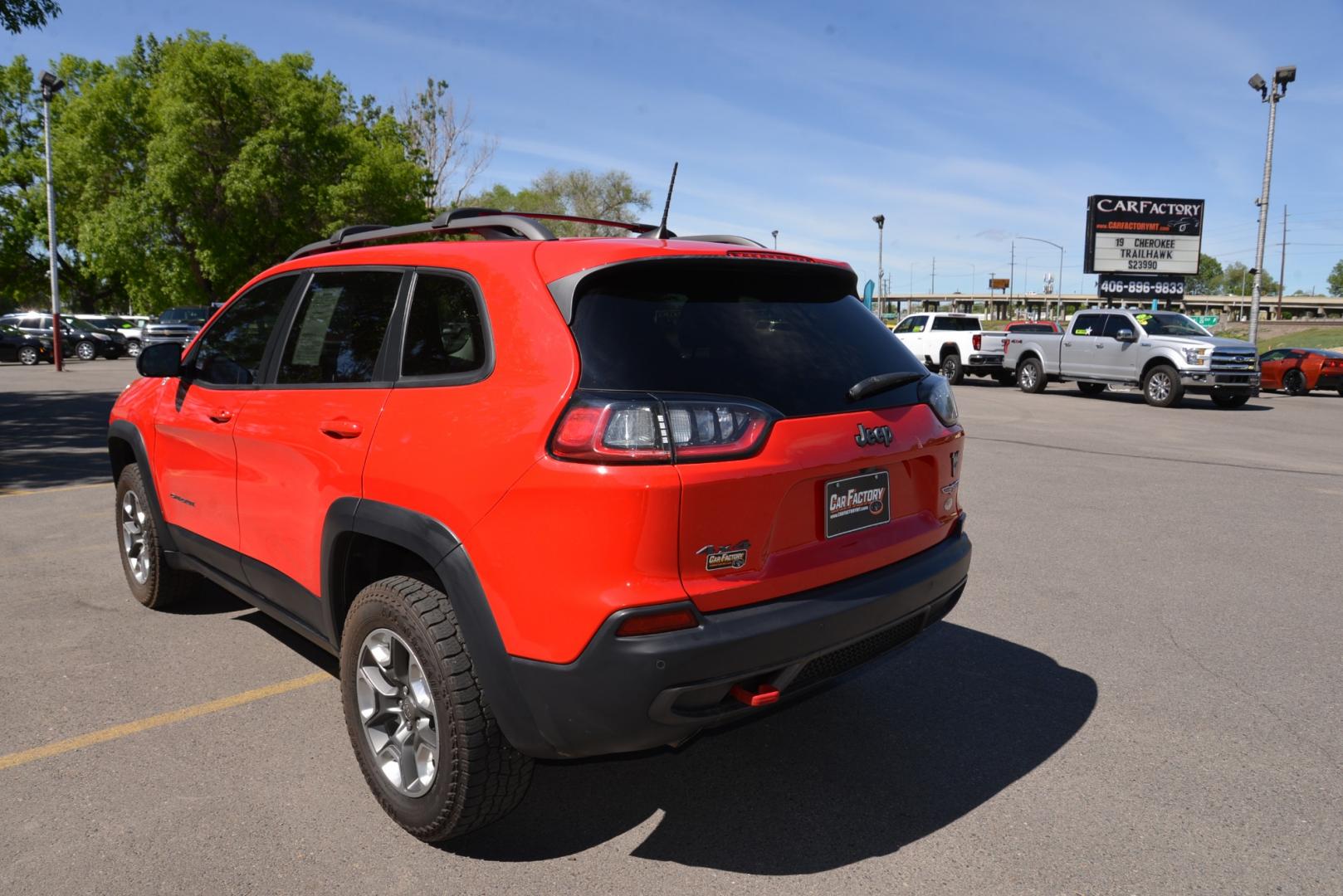 2019 Firecracker Red /Black Leather Jeep Cherokee Trailhawk (1C4PJMBXXKD) with an 3.2L V6 engine, 9 speed automatic transmission, located at 4562 State Avenue, Billings, MT, 59101, (406) 896-9833, 45.769516, -108.526772 - 2019 Jeep Cherokee Trail Hawk 4x4 The Trail Hawk is a Low Mileage Local trade in, it is a 1 Owner jeep. The interior and exterior are in very clean condition and the suv runs and drives nicely. The Tires are 17 Inch Open Range All Terrain's and they are in good condition. it has a 3.2 Liter V6, 9 - Photo#5