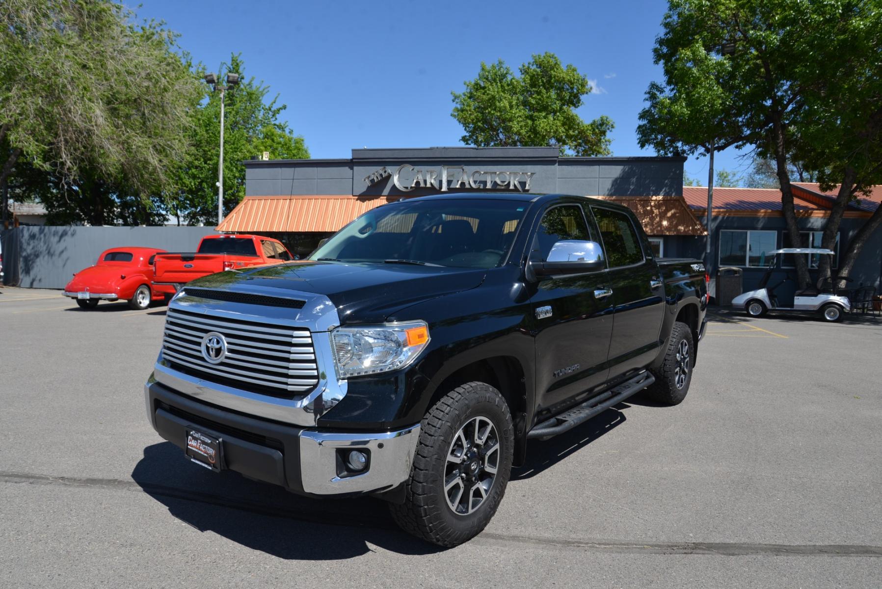 2014 Black /Black Toyota Tundra Limited TRD (5TFHY5F11EX) with an 5.7L V8 engine, 6 speed automatic transmission, located at 4562 State Avenue, Billings, MT, 59101, (406) 896-9833, 45.769516, -108.526772 - This is a 2014 Toyota Tundra Limited T R D CrewMax 4 Wheel Drive With a 5.7 Liter i-Force V8 capable of 381 Horsepower and 401 Pound Foot of Torque  ,  6 Speed automatic transmission with sequential Shift, 4 30 Rear differential, 10,000 pound GVWR,  trailer tow package with Trailer-sway contro - Photo #1