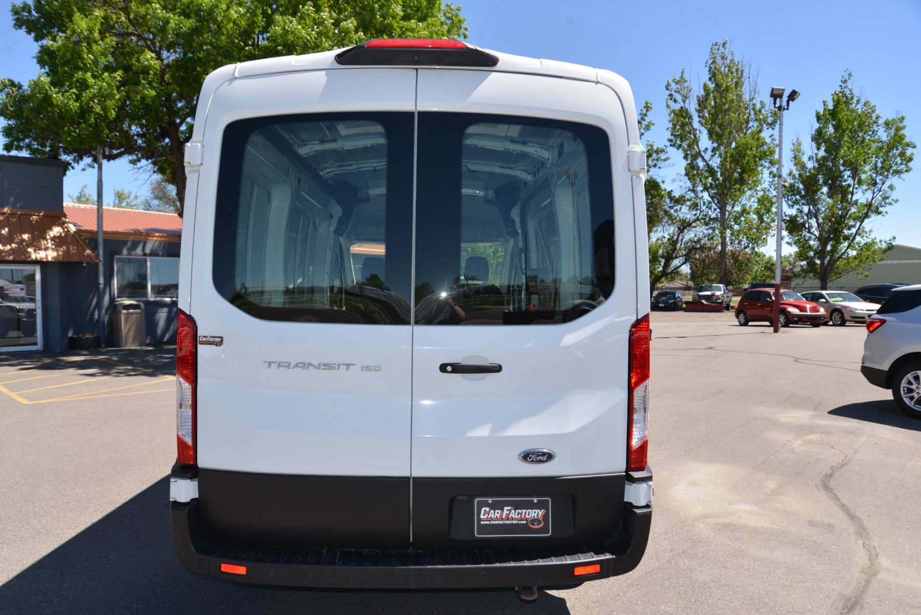 2019 White /Gray Ford Transit Cargo Van (1FTYE1CM2KK) with an 3.7 engine, 6 speed automatic transmission, located at 4562 State Avenue, Billings, MT, 59101, (406) 896-9833, 45.769516, -108.526772 - 2019 Ford Transit 150 Van Med. Roof w/Sliding Pass. 130-in. WB - One owner! 3.7 TIVCT V6 engine - 6 speed automatic select shift transmission - rear wheel drive - 93,307 miles - Inspected and serviced - copy of inspection and work performed as well as a complete vehicle history report provided - Photo #9