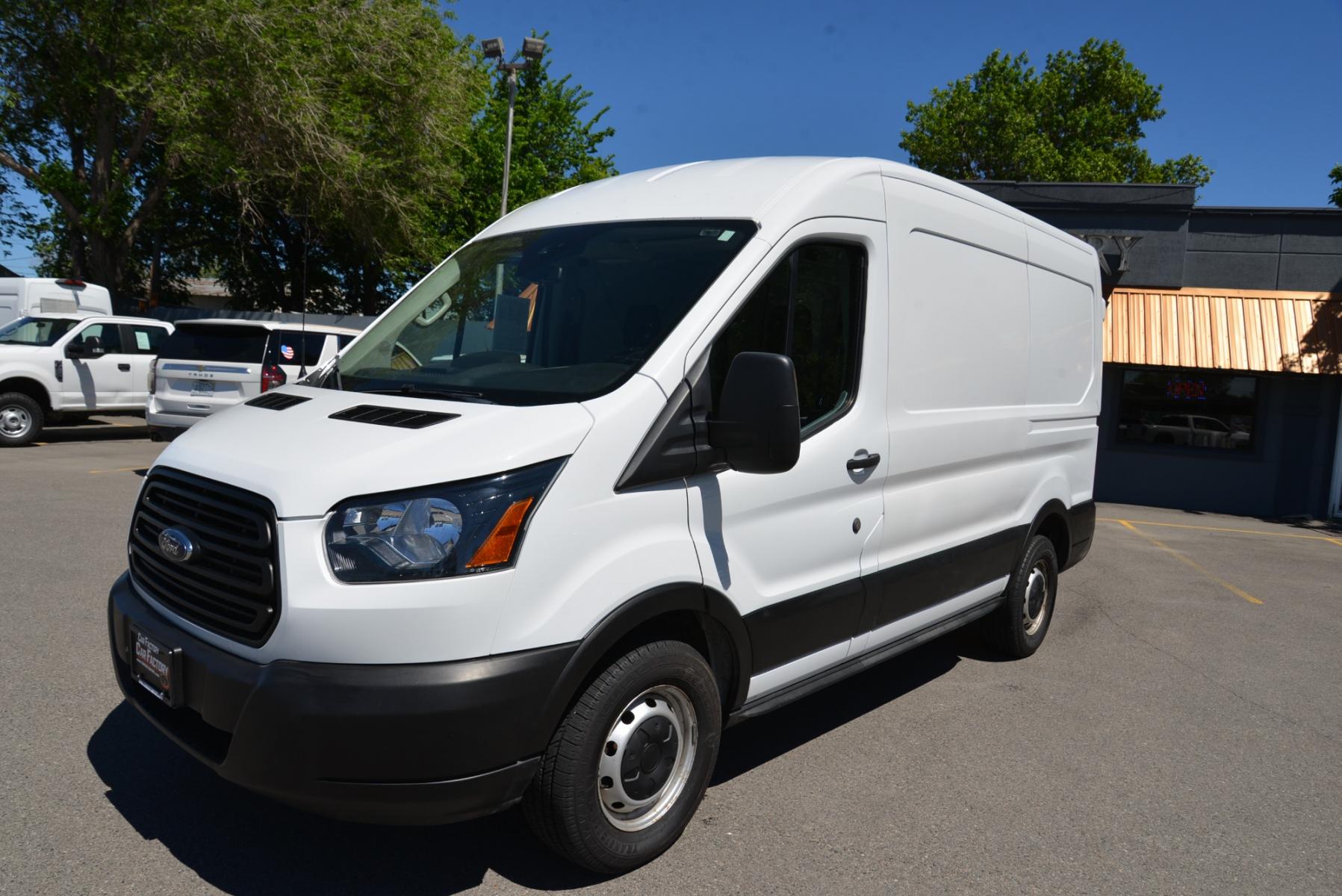 2019 White /Gray Ford Transit Cargo Van (1FTYE1CM2KK) with an 3.7 engine, 6 speed automatic transmission, located at 4562 State Avenue, Billings, MT, 59101, (406) 896-9833, 45.769516, -108.526772 - 2019 Ford Transit 150 Van Med. Roof w/Sliding Pass. 130-in. WB - One owner! 3.7 TIVCT V6 engine - 6 speed automatic select shift transmission - rear wheel drive - 93,307 miles - Inspected and serviced - copy of inspection and work performed as well as a complete vehicle history report provided - Photo #2