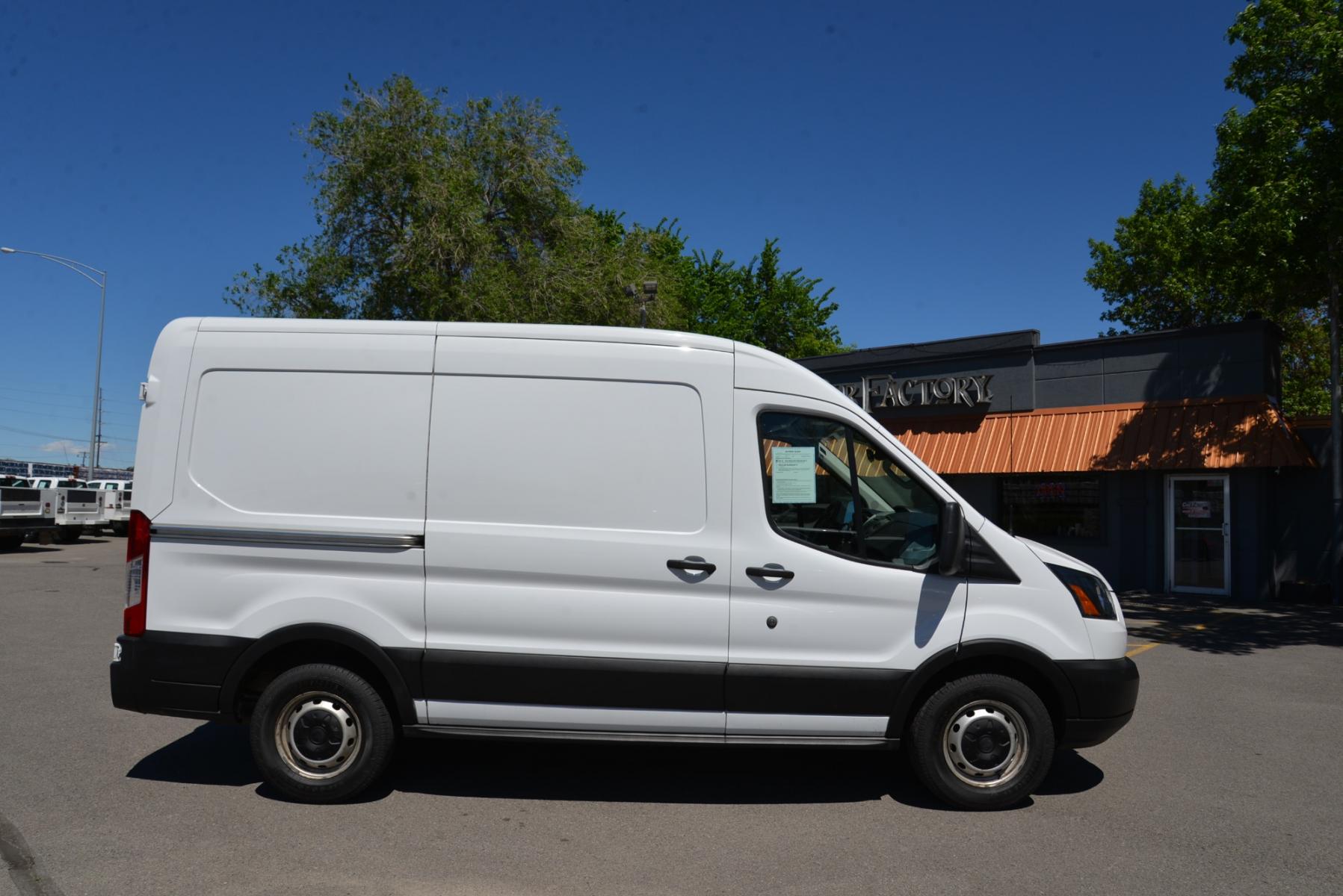 2019 White /Gray Ford Transit Cargo Van (1FTYE1CM2KK) with an 3.7 engine, 6 speed automatic transmission, located at 4562 State Avenue, Billings, MT, 59101, (406) 896-9833, 45.769516, -108.526772 - Photo #6