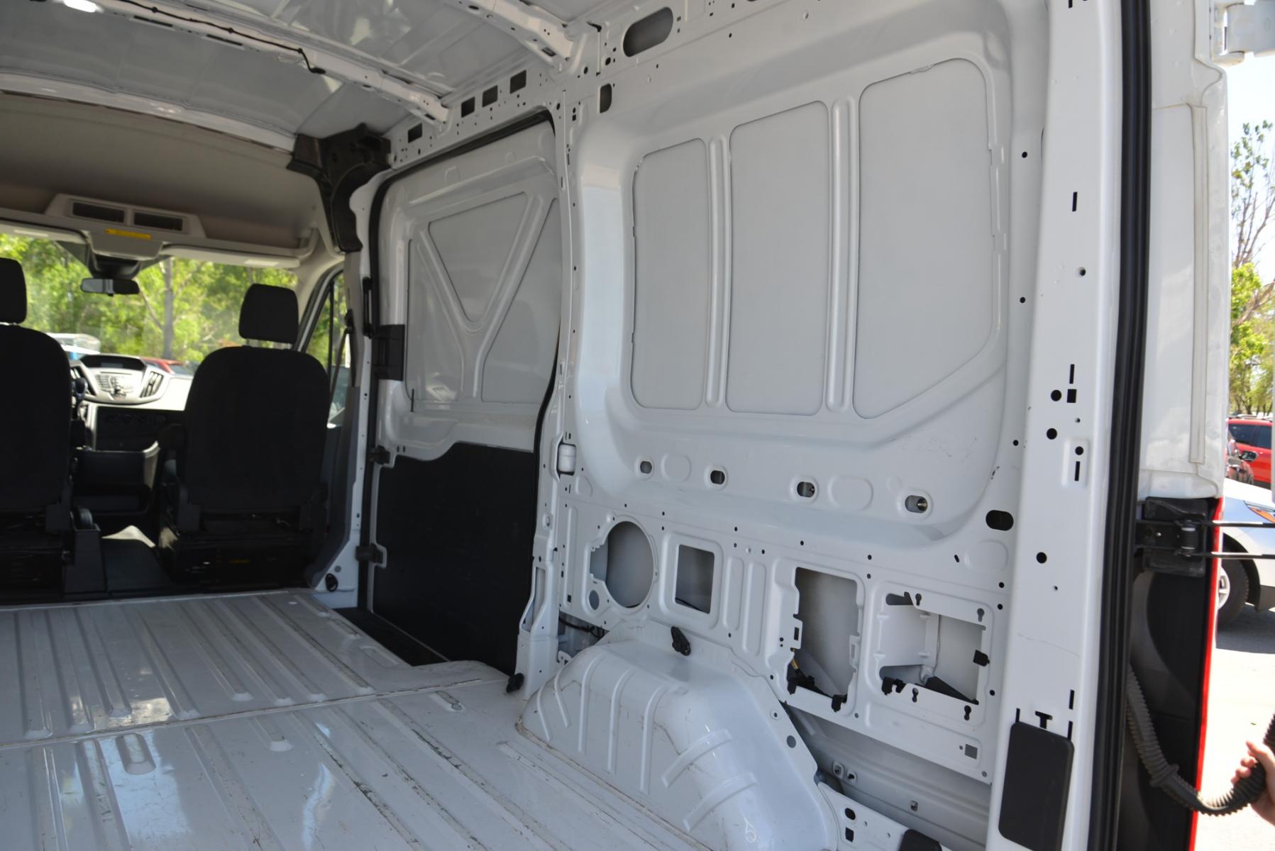 2019 White /Gray Ford Transit Cargo Van (1FTYE1CM2KK) with an 3.7 engine, 6 speed automatic transmission, located at 4562 State Avenue, Billings, MT, 59101, (406) 896-9833, 45.769516, -108.526772 - 2019 Ford Transit 150 Van Med. Roof w/Sliding Pass. 130-in. WB - One owner! 3.7 TIVCT V6 engine - 6 speed automatic select shift transmission - rear wheel drive - 93,307 miles - Inspected and serviced - copy of inspection and work performed as well as a complete vehicle history report provided - Photo #11