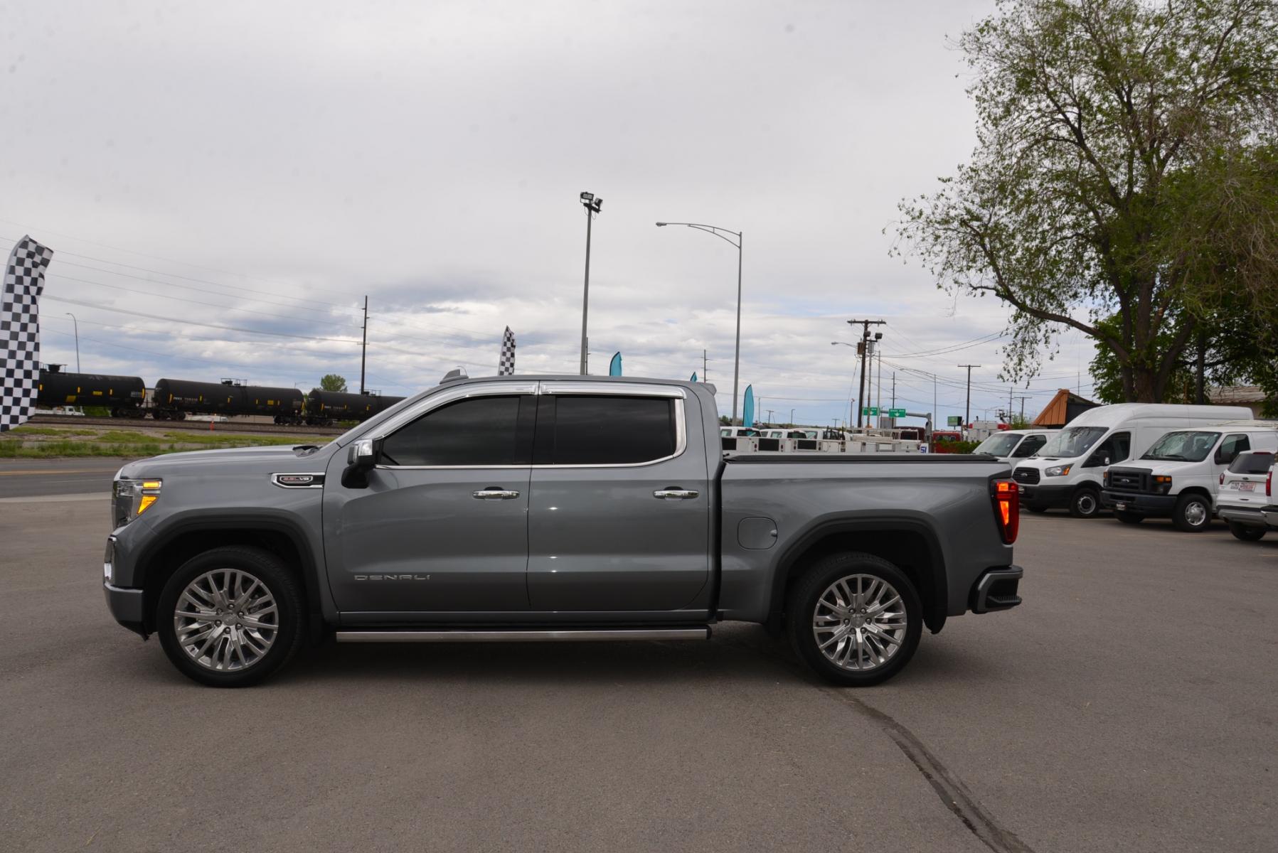2019 Grey /Dark Ash GMC Sierra 1500 Denali Ultimate (1GTU9FEL7KZ) with an 6.2L V8 engine, Automatic transmission, located at 4562 State Avenue, Billings, MT, 59101, (406) 896-9833, 45.769516, -108.526772 - 2019 GMC Sierra 1500 4WD Crew Cab Denali This 2019 GMC Sierra 1500 Denali offers an exceptional blend of luxury, performance, and cutting-edge technology. Here are the standout features that make this truck a top choice: Performance & Capability Powerful Engine: The 6.2L V8 engine paired wit - Photo #2