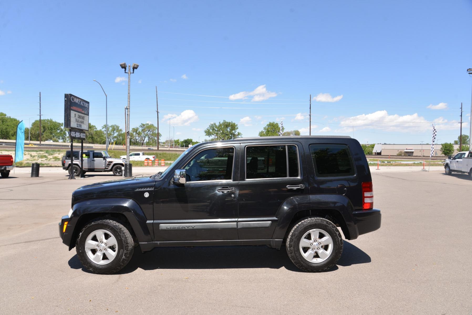 2010 Black /Grey Jeep Liberty Sport (1J4PN2GK9AW) with an 3.7L V6 engine, 4 speed Automatic transmission, located at 4562 State Avenue, Billings, MT, 59101, (406) 896-9833, 45.769516, -108.526772 - Photo #1