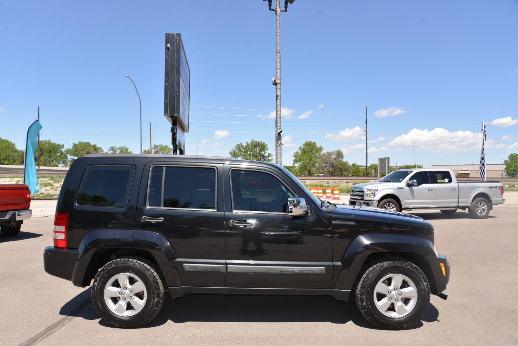 2010 Black /Grey Jeep Liberty Sport (1J4PN2GK9AW) with an 3.7L V6 engine, 4 speed Automatic transmission, located at 4562 State Avenue, Billings, MT, 59101, (406) 896-9833, 45.769516, -108.526772 - Photo #7