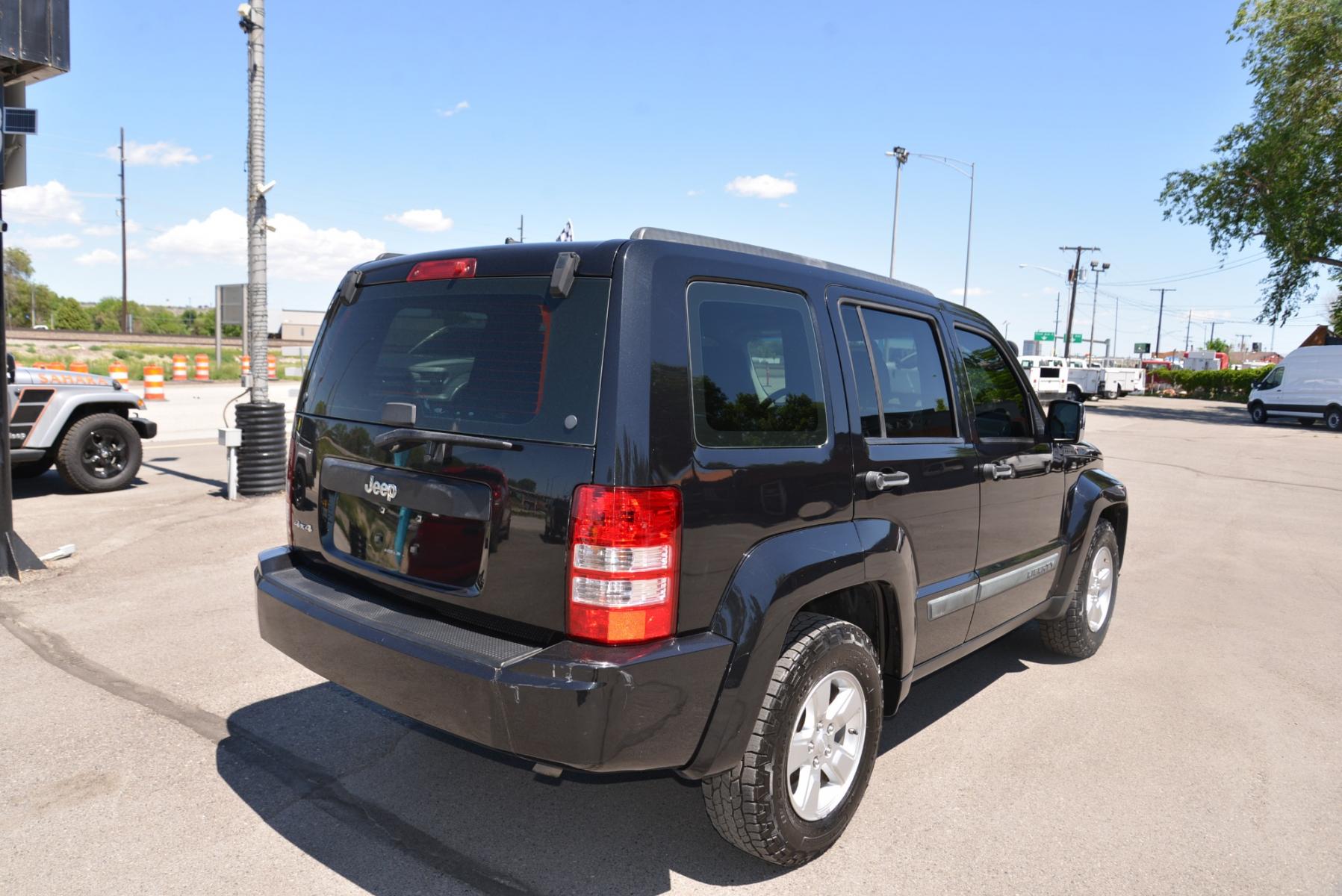 2010 Black /Grey Jeep Liberty Sport (1J4PN2GK9AW) with an 3.7L V6 engine, 4 speed Automatic transmission, located at 4562 State Avenue, Billings, MT, 59101, (406) 896-9833, 45.769516, -108.526772 - Photo #8