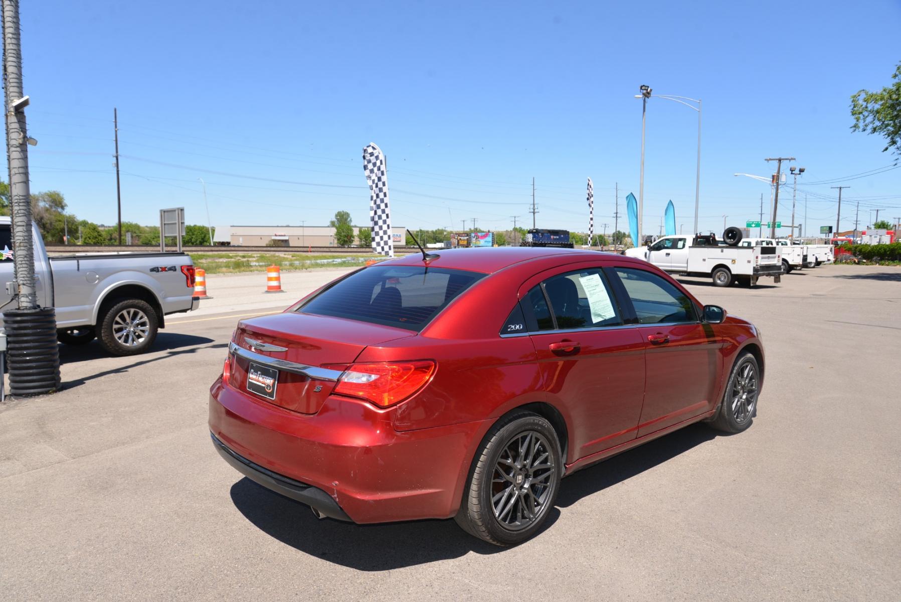 2014 Deep Cherry Red Crystal Pearlcoat /Black Chrysler 200 S (1C3CCBBG8EN) with an 3.6L V6 engine, 6 speed automatic transmission, located at 4562 State Avenue, Billings, MT, 59101, (406) 896-9833, 45.769516, -108.526772 - Photo #6