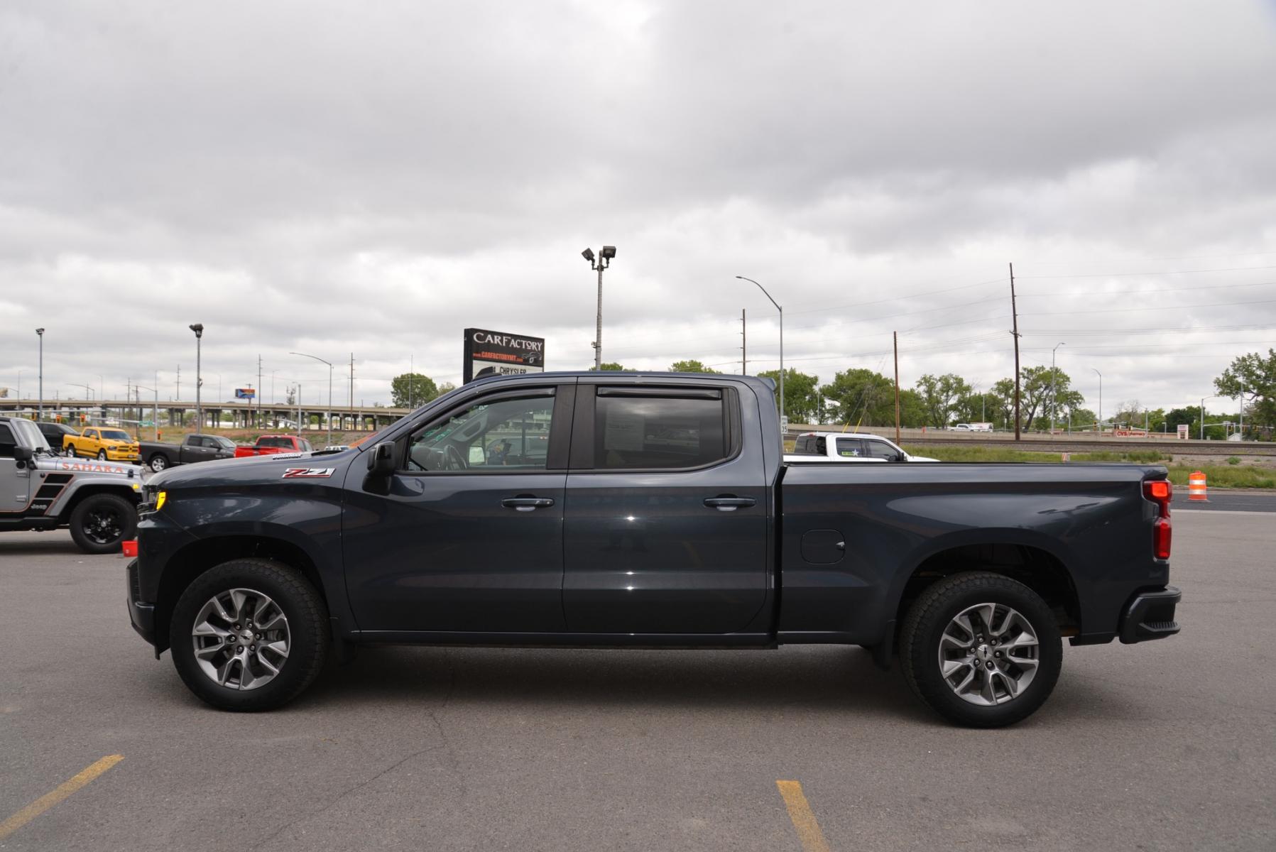 2021 Grey /Black Chevrolet Silverado 1500 RST (1GCUYEET1MZ) with an 3.0L Duramax Diesel engine, 10 Speed Automatic transmission, located at 4562 State Avenue, Billings, MT, 59101, (406) 896-9833, 45.769516, -108.526772 - 2021 Chevy 1500 crew cab 4x4, RST with a 3 Liter Duramax engine, 10 speed Automatic , 3 23 rear axle, 7000 Pound Gvwr, with only 30.081 Miles Features include: All star Edition Z71 package Convenience Package Large 8 inch touch screen Chevy mylink Infotainment with Sirius XM , Bluetooth, wit - Photo #1