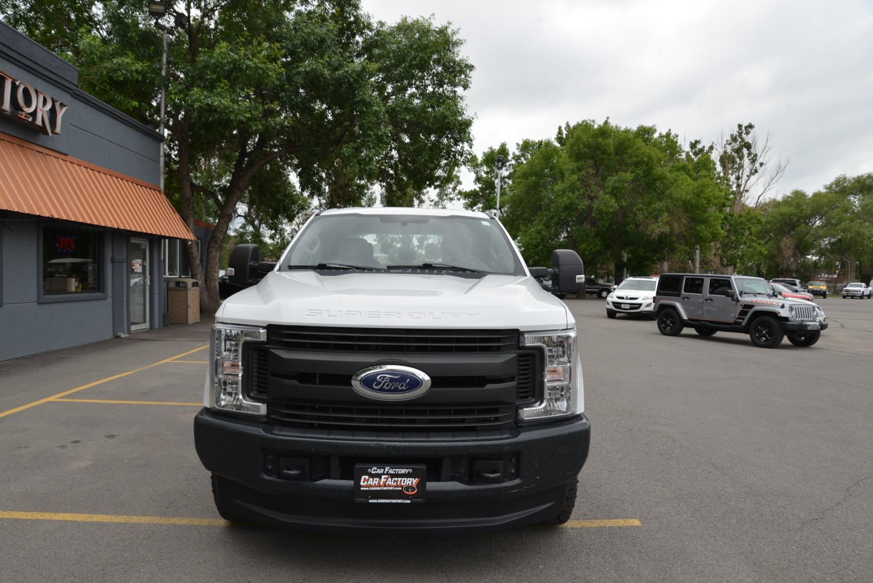 2019 White /Grey Ford F-350 SD XL (1FD8W3B61KE) with an 6.2L V8 engine, 6 speed automatic transmission, located at 4562 State Avenue, Billings, MT, 59101, (406) 896-9833, 45.769516, -108.526772 - 2019 Ford F-350 SD Crew Cab 4x4 6.2L V8, 6 Speed Automatic transmission, 3.73 Electronic Locking Axle, 10,800 Pound GVWR package, Skid Plates, Trailer Brake Controller Features include: Preferred Equipment Package Air Conditioning Power Windows and Locks Cruise Control, Tilt Steering Wheel - Photo #3