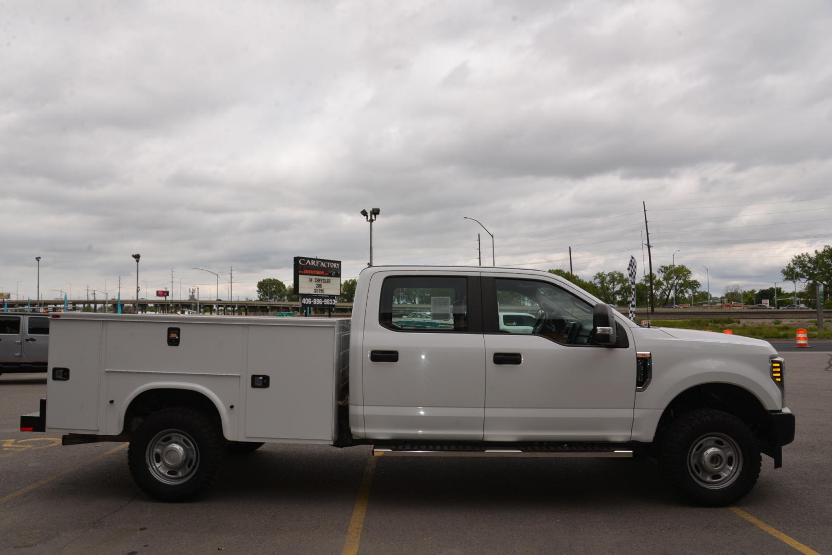 2019 White /Grey Ford F-350 SD XL (1FD8W3B61KE) with an 6.2L V8 engine, 6 speed automatic transmission, located at 4562 State Avenue, Billings, MT, 59101, (406) 896-9833, 45.769516, -108.526772 - 2019 Ford F-350 SD Crew Cab 4x4 6.2L V8, 6 Speed Automatic transmission, 3.73 Electronic Locking Axle, 10,800 Pound GVWR package, Skid Plates, Trailer Brake Controller Features include: Preferred Equipment Package Air Conditioning Power Windows and Locks Cruise Control, Tilt Steering Wheel - Photo#5