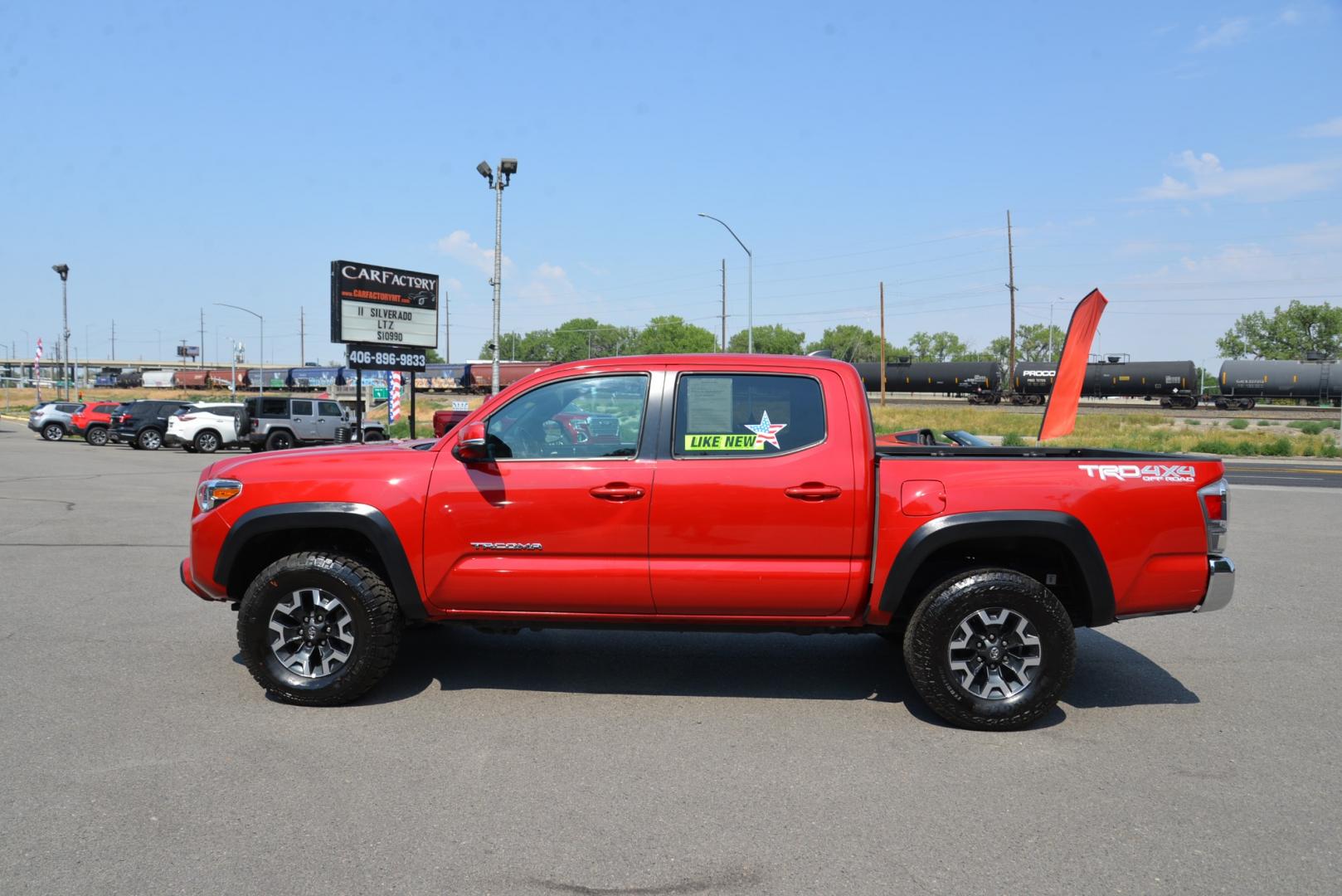 2023 BARCELONA RED METALLIC /Grey Toyota Tacoma TRD OFF-ROAD (3TMCZ5AN5PM) with an 3.5 Liter Atkinson Cycle V6 engine, 6 speed automatic transmission, located at 4562 State Avenue, Billings, MT, 59101, (406) 896-9833, 45.769516, -108.526772 - 2023 Toyota Tacoma Double Cab TRD Off Road 4x4 with a 5 foot bed with a 3.5 Liter Atkinson Cycle V6. 6 Speed Automatic Transmission, 4WDemand: Part-Time 4x4 System with 2 Speed Electronic Controlled Transfer Case, Off-Road Tuned Suspension with Bilstein Shocks, Electronic Controlled Locking Rea - Photo#1