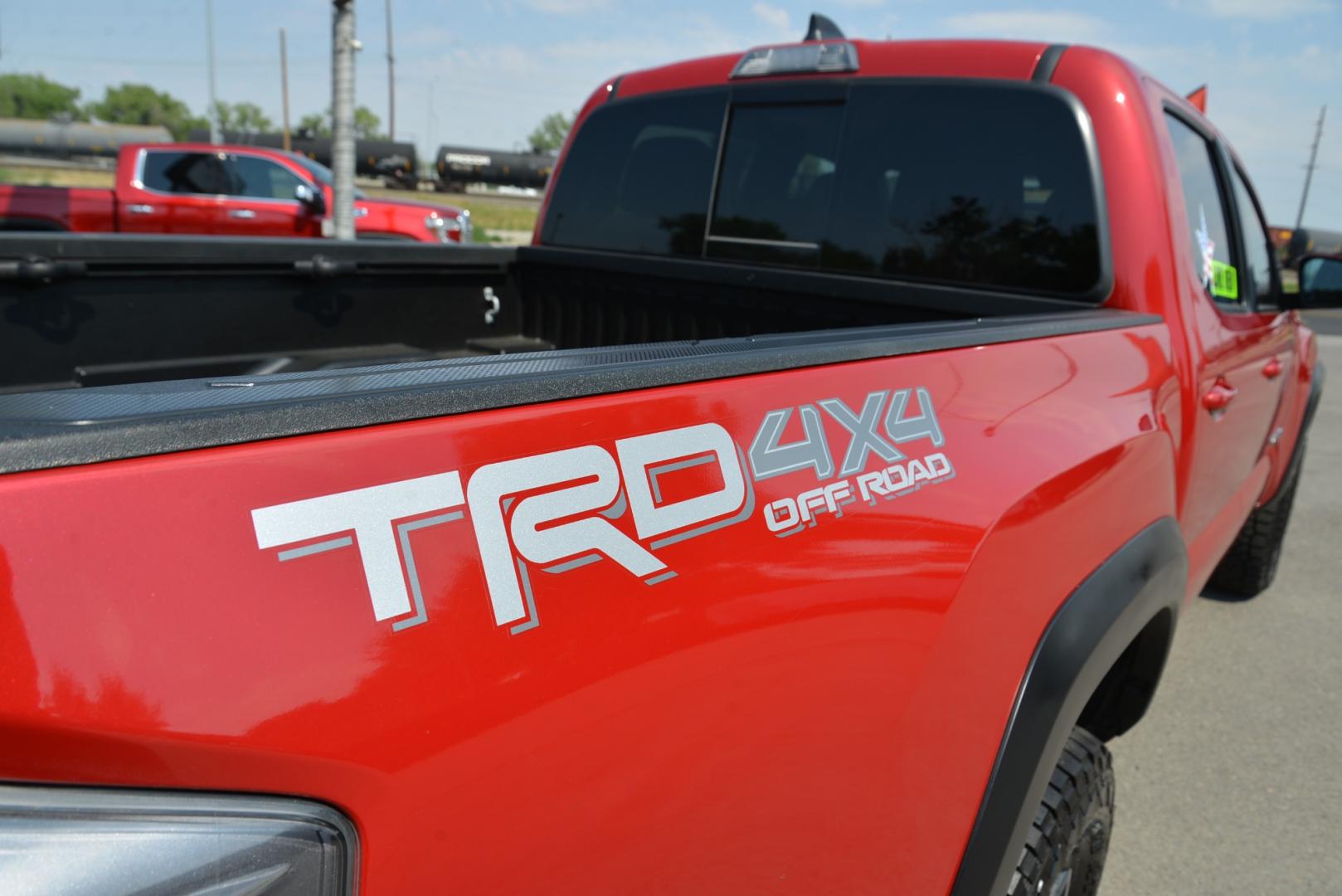 2023 BARCELONA RED METALLIC /Grey Toyota Tacoma TRD OFF-ROAD (3TMCZ5AN5PM) with an 3.5 Liter Atkinson Cycle V6 engine, 6 speed automatic transmission, located at 4562 State Avenue, Billings, MT, 59101, (406) 896-9833, 45.769516, -108.526772 - 2023 Toyota Tacoma Double Cab TRD Off Road 4x4 with a 5 foot bed with a 3.5 Liter Atkinson Cycle V6. 6 Speed Automatic Transmission, 4WDemand: Part-Time 4x4 System with 2 Speed Electronic Controlled Transfer Case, Off-Road Tuned Suspension with Bilstein Shocks, Electronic Controlled Locking Rea - Photo#9