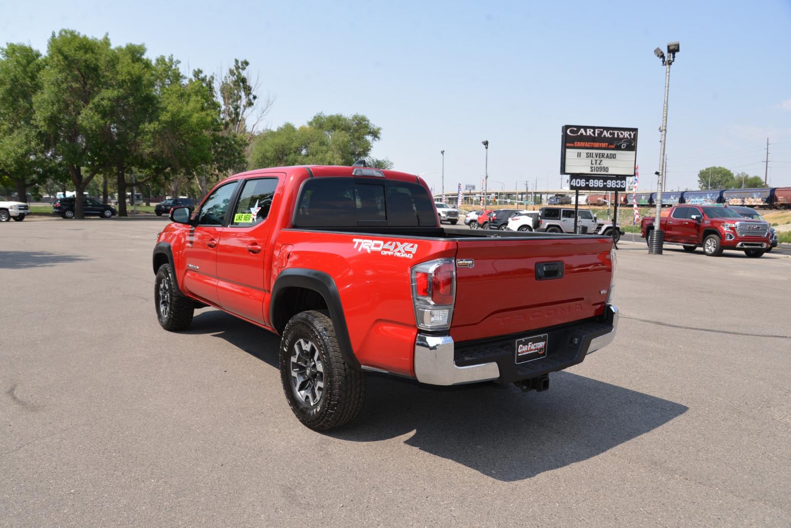 2023 BARCELONA RED METALLIC /Grey Toyota Tacoma TRD OFF-ROAD (3TMCZ5AN5PM) with an 3.5 Liter Atkinson Cycle V6 engine, 6 speed automatic transmission, located at 4562 State Avenue, Billings, MT, 59101, (406) 896-9833, 45.769516, -108.526772 - 2023 Toyota Tacoma Double Cab TRD Off Road 4x4 with a 5 foot bed with a 3.5 Liter Atkinson Cycle V6. 6 Speed Automatic Transmission, 4WDemand: Part-Time 4x4 System with 2 Speed Electronic Controlled Transfer Case, Off-Road Tuned Suspension with Bilstein Shocks, Electronic Controlled Locking Rea - Photo#3