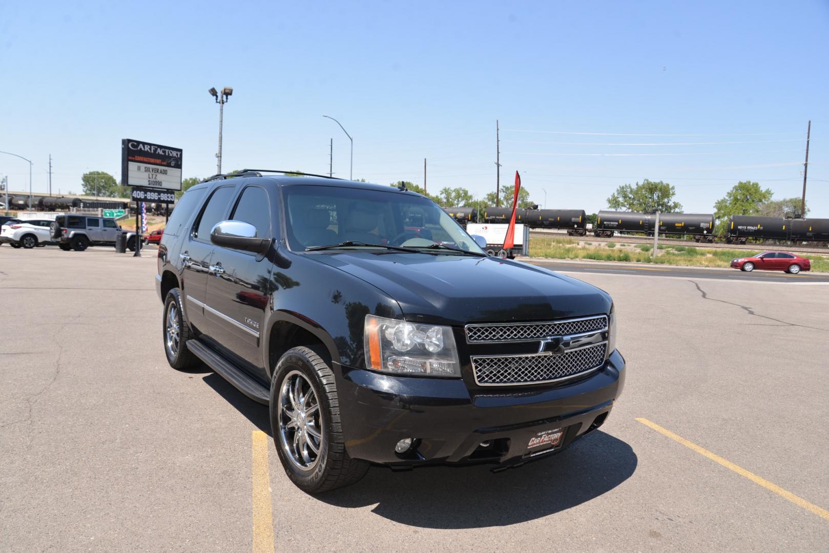 2011 Black Granite Metallic /Light Titanium/Dark Titanium Chevrolet Tahoe LTZ (1GNSKCE03BR) with an 5.3L V8 engine, 6 speed automatic transmission, located at 4562 State Avenue, Billings, MT, 59101, (406) 896-9833, 45.769516, -108.526772 - 2011 Chevy Tahoe 4 Wheel Drive, with a 5.3 Liter V8, 6 Speed automatic transmission,  3.42 ratio Rear Axle, 7300 pound GVWR , Heavy duty locking rear differential and Heavy duty Trailering package Features include LTZ package Sun, Entertainment and destinations package 2nd row captains chairs a - Photo#2