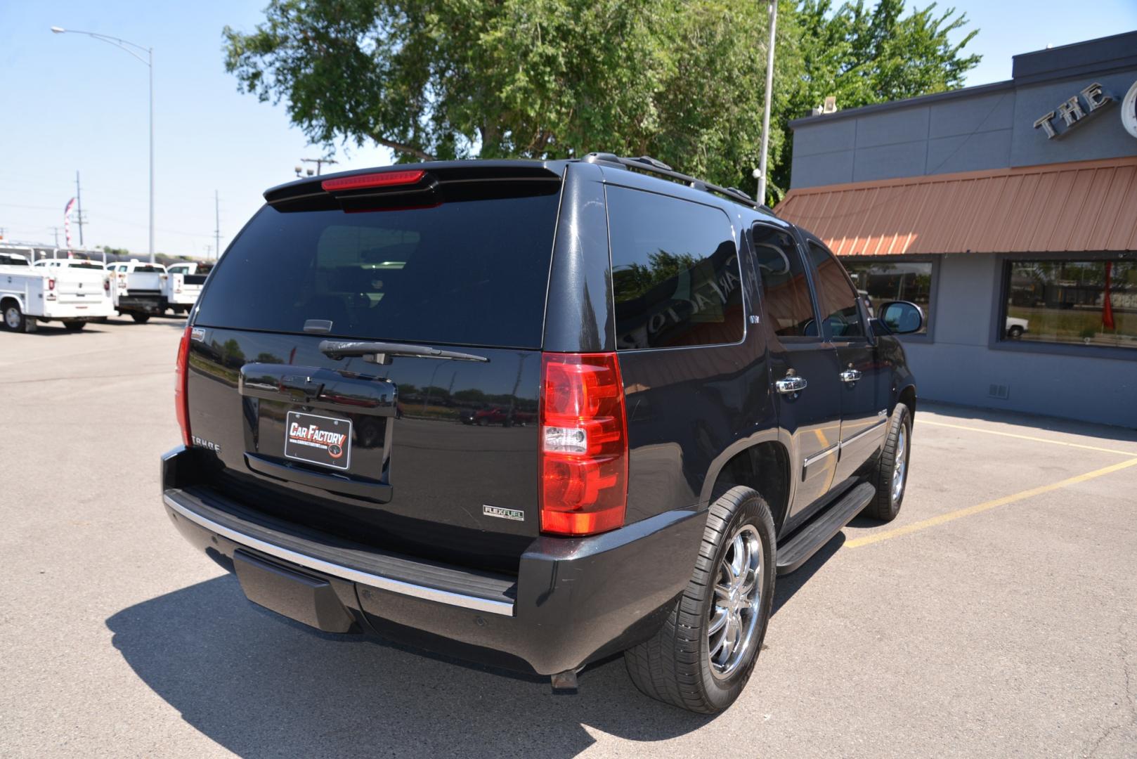 2011 Black Granite Metallic /Light Titanium/Dark Titanium Chevrolet Tahoe LTZ (1GNSKCE03BR) with an 5.3L V8 engine, 6 speed automatic transmission, located at 4562 State Avenue, Billings, MT, 59101, (406) 896-9833, 45.769516, -108.526772 - 2011 Chevy Tahoe 4 Wheel Drive, with a 5.3 Liter V8, 6 Speed automatic transmission,  3.42 ratio Rear Axle, 7300 pound GVWR , Heavy duty locking rear differential and Heavy duty Trailering package Features include LTZ package Sun, Entertainment and destinations package 2nd row captains chairs a - Photo#3