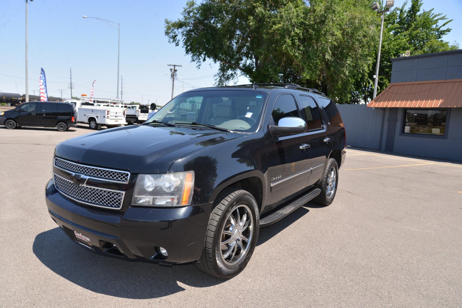 2011 Black Granite Metallic /Light Titanium/Dark Titanium Chevrolet Tahoe LTZ (1GNSKCE03BR) with an 5.3L V8 engine, 6 speed automatic transmission, located at 4562 State Avenue, Billings, MT, 59101, (406) 896-9833, 45.769516, -108.526772 - 2011 Chevy Tahoe 4 Wheel Drive, with a 5.3 Liter V8, 6 Speed automatic transmission,  3.42 ratio Rear Axle, 7300 pound GVWR , Heavy duty locking rear differential and Heavy duty Trailering package Features include LTZ package Sun, Entertainment and destinations package 2nd row captains chairs a - Photo#6