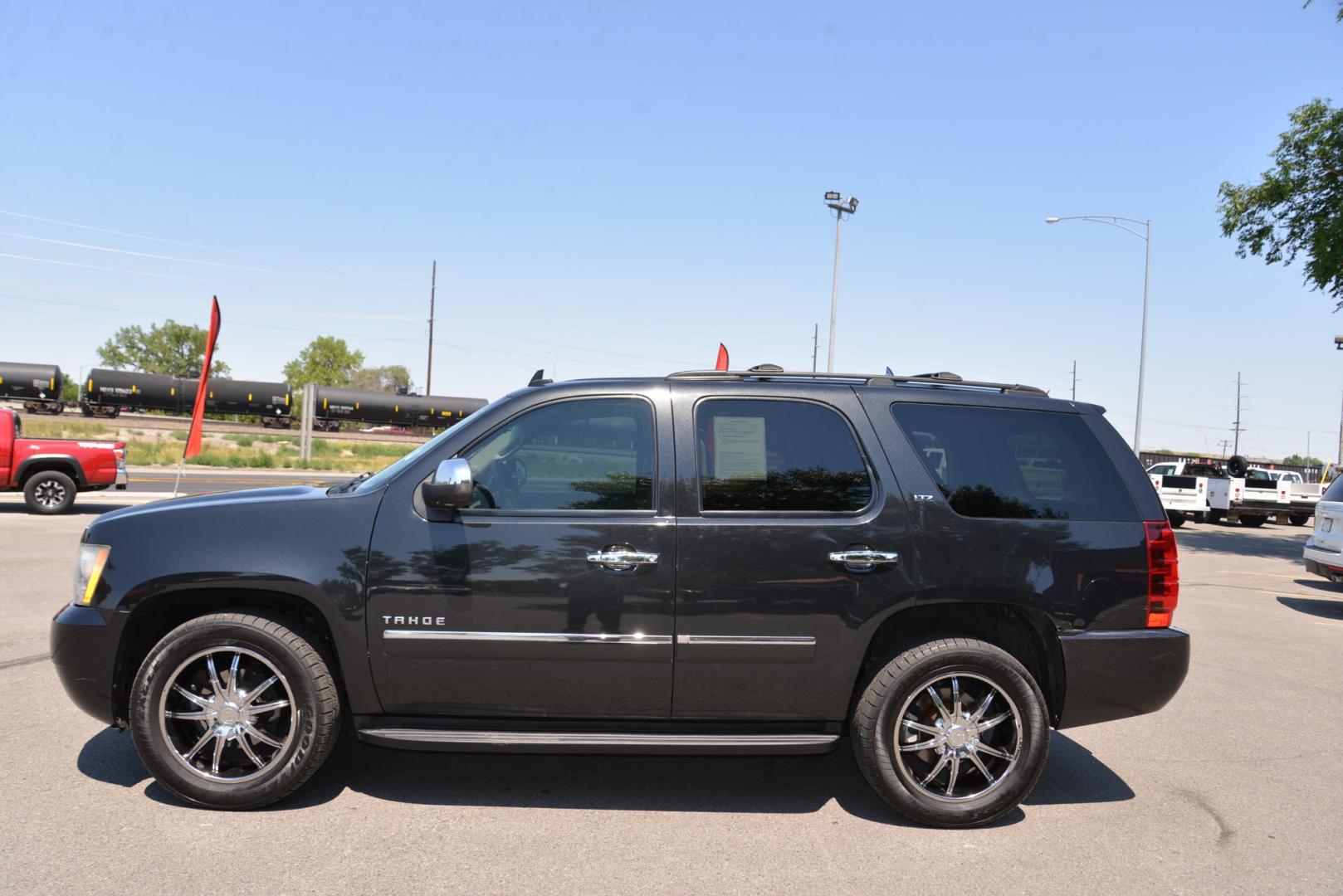 2011 Black Granite Metallic /Light Titanium/Dark Titanium Chevrolet Tahoe LTZ (1GNSKCE03BR) with an 5.3L V8 engine, 6 speed automatic transmission, located at 4562 State Avenue, Billings, MT, 59101, (406) 896-9833, 45.769516, -108.526772 - 2011 Chevy Tahoe 4 Wheel Drive, with a 5.3 Liter V8, 6 Speed automatic transmission,  3.42 ratio Rear Axle, 7300 pound GVWR , Heavy duty locking rear differential and Heavy duty Trailering package Features include LTZ package Sun, Entertainment and destinations package 2nd row captains chairs a - Photo#5