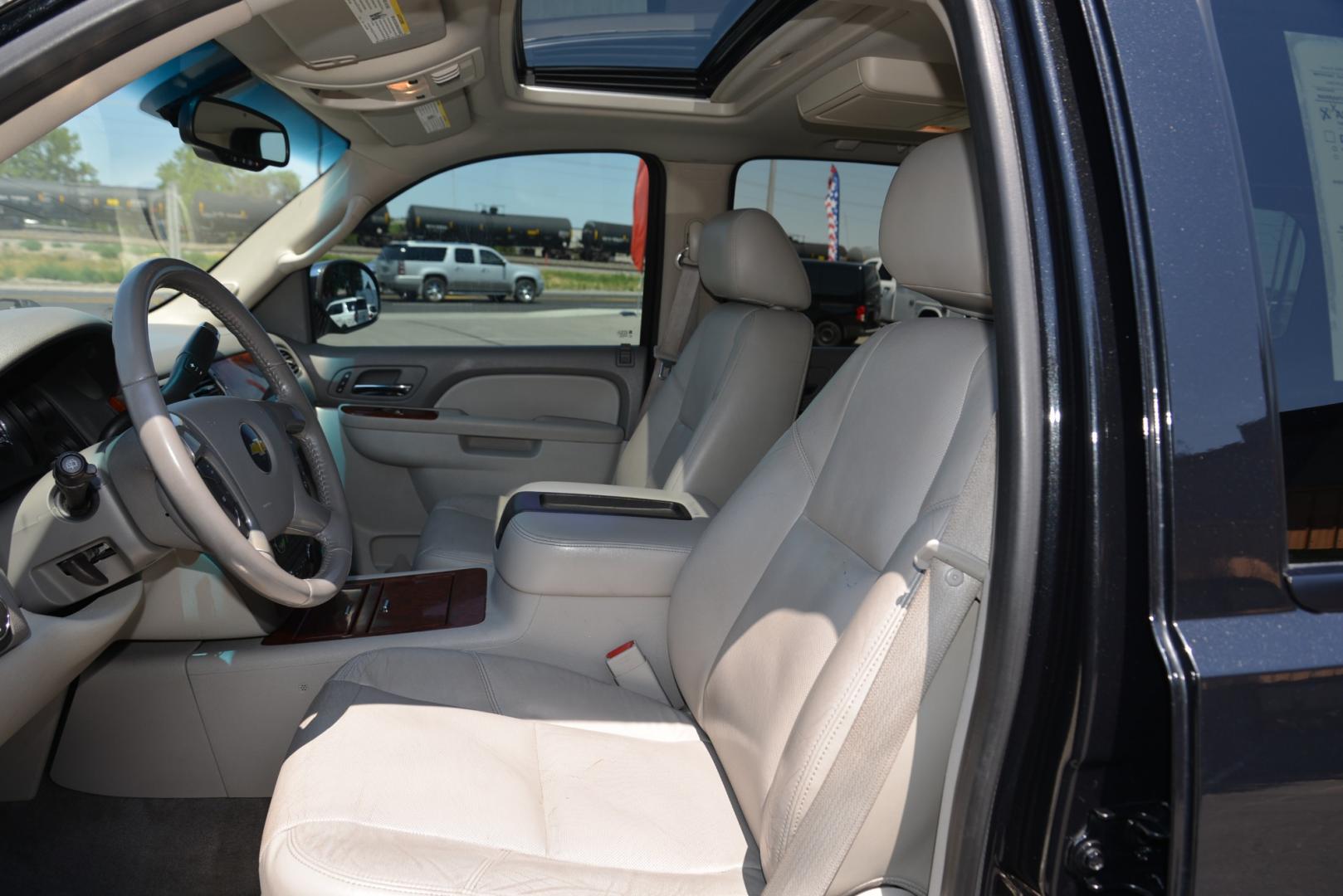 2011 Black Granite Metallic /Light Titanium/Dark Titanium Chevrolet Tahoe LTZ (1GNSKCE03BR) with an 5.3L V8 engine, 6 speed automatic transmission, located at 4562 State Avenue, Billings, MT, 59101, (406) 896-9833, 45.769516, -108.526772 - 2011 Chevy Tahoe 4 Wheel Drive, with a 5.3 Liter V8, 6 Speed automatic transmission,  3.42 ratio Rear Axle, 7300 pound GVWR , Heavy duty locking rear differential and Heavy duty Trailering package Features include LTZ package Sun, Entertainment and destinations package 2nd row captains chairs a - Photo#11