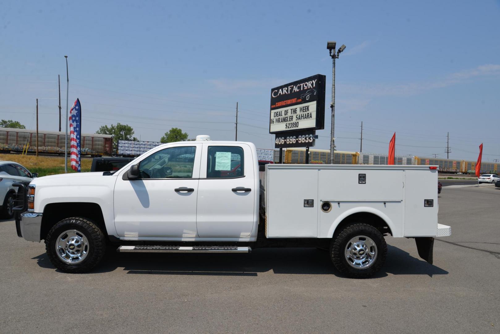 2015 white /Grey Chevrolet Silverado 2500HD Work Truck Double Cab 4WD (1GB2KUEG0FZ) with an 6.0L V8 OHV 16V FFV engine, 6-Speed Automatic transmission, located at 4562 State Avenue, Billings, MT, 59101, (406) 896-9833, 45.769516, -108.526772 - 6.0L V8 OHV 16V FFV Gasoline Engine - 6-Speed Automatic Transmission - 4WD - 149,510 miles - One owner - Inspected and serviced - Copy of inspection and work performed as well as full history report provided! Work Truck Package - air conditioning - tilt steering wheel - cruise control - AM/FM aud - Photo#2