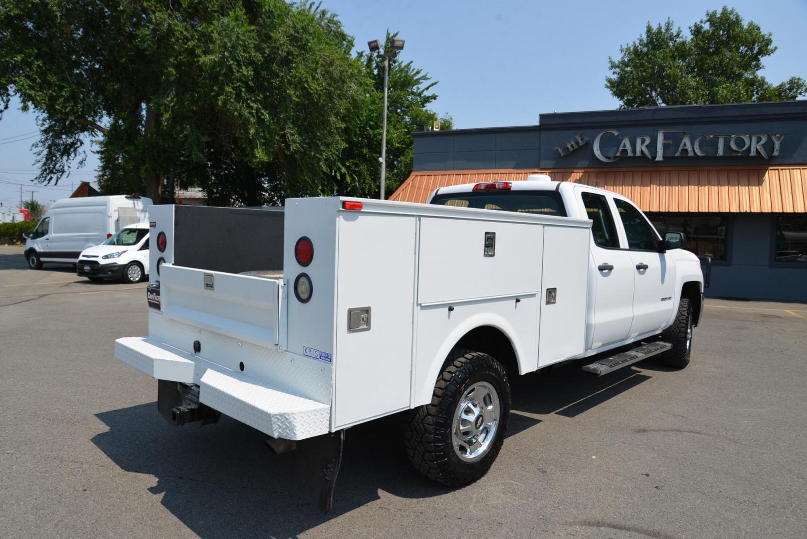 2015 white /Grey Chevrolet Silverado 2500HD Work Truck Double Cab 4WD (1GB2KUEG0FZ) with an 6.0L V8 OHV 16V FFV engine, 6-Speed Automatic transmission, located at 4562 State Avenue, Billings, MT, 59101, (406) 896-9833, 45.769516, -108.526772 - 6.0L V8 OHV 16V FFV Gasoline Engine - 6-Speed Automatic Transmission - 4WD - 149,510 miles - One owner - Inspected and serviced - Copy of inspection and work performed as well as full history report provided! Work Truck Package - air conditioning - tilt steering wheel - cruise control - AM/FM aud - Photo#11